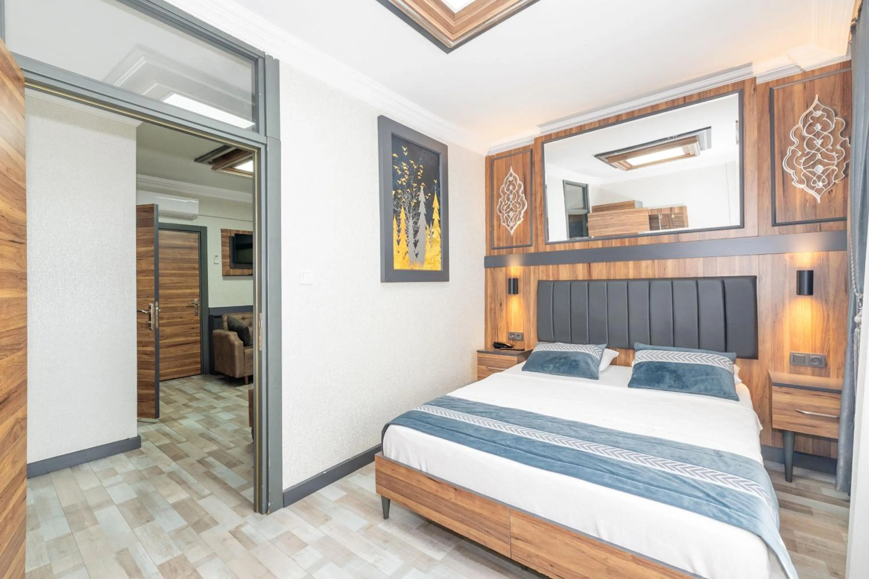 Bed in La Serena Taxim Hotel