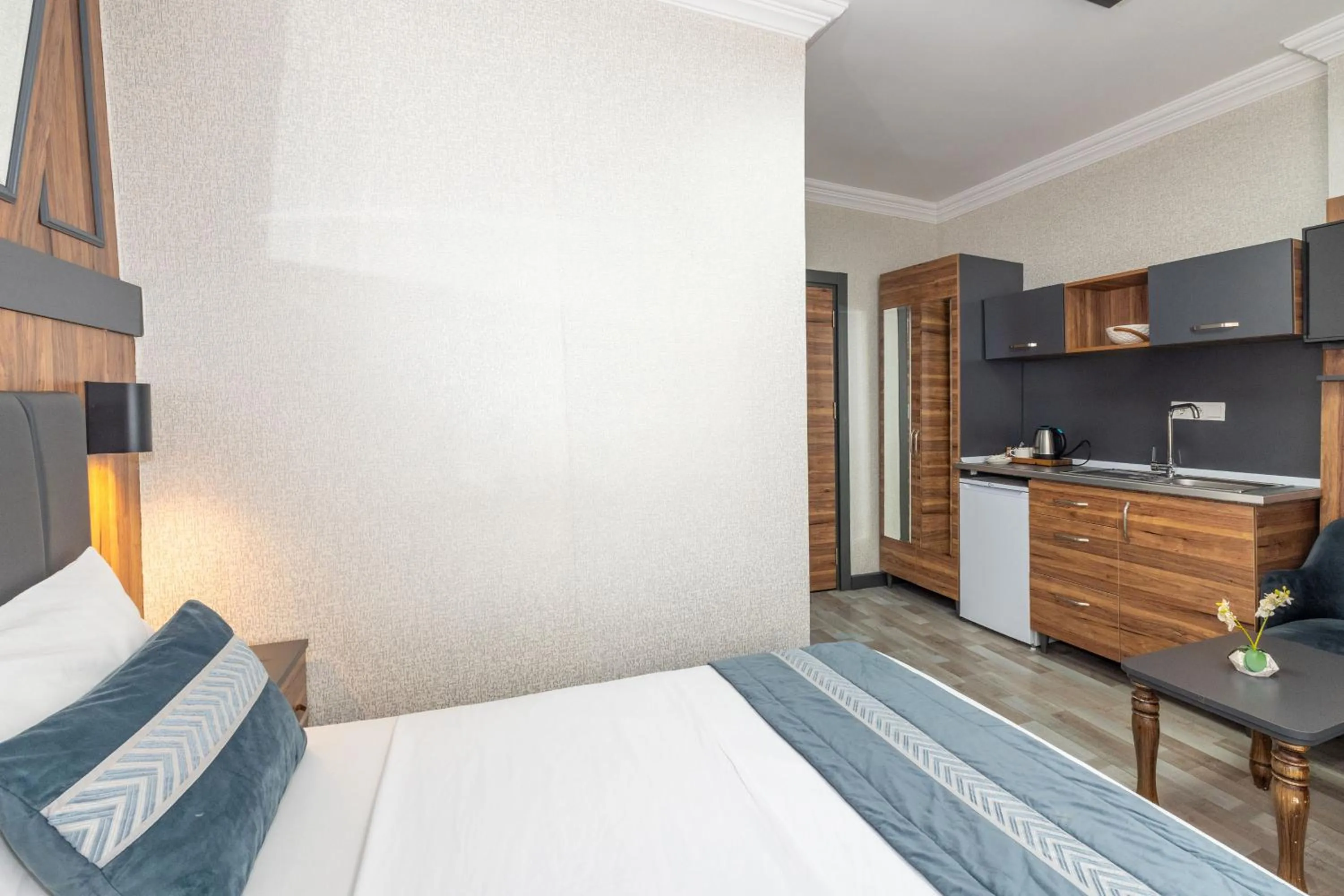 Bed in La Serena Taxim Hotel