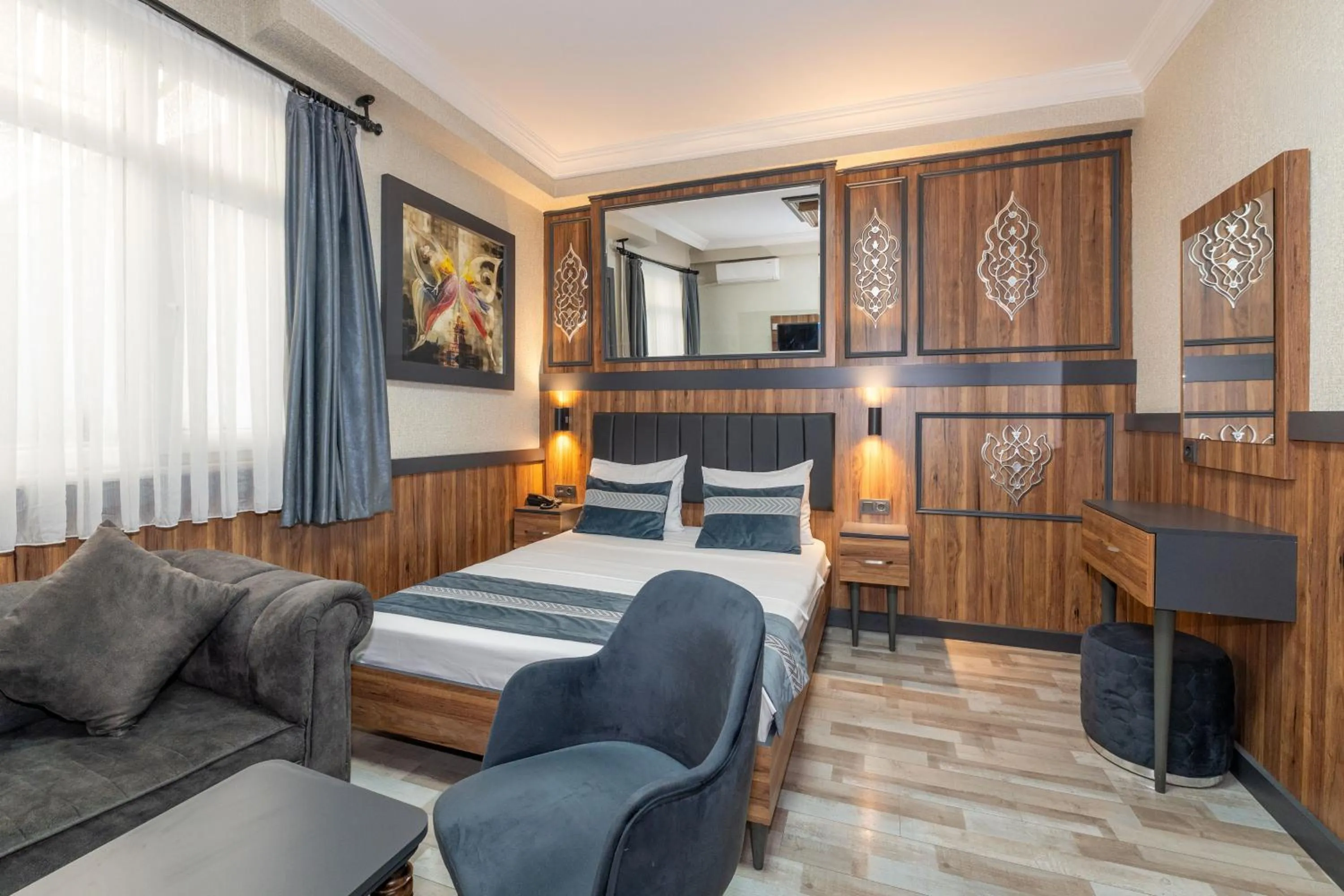 Bed in La Serena Taxim Hotel