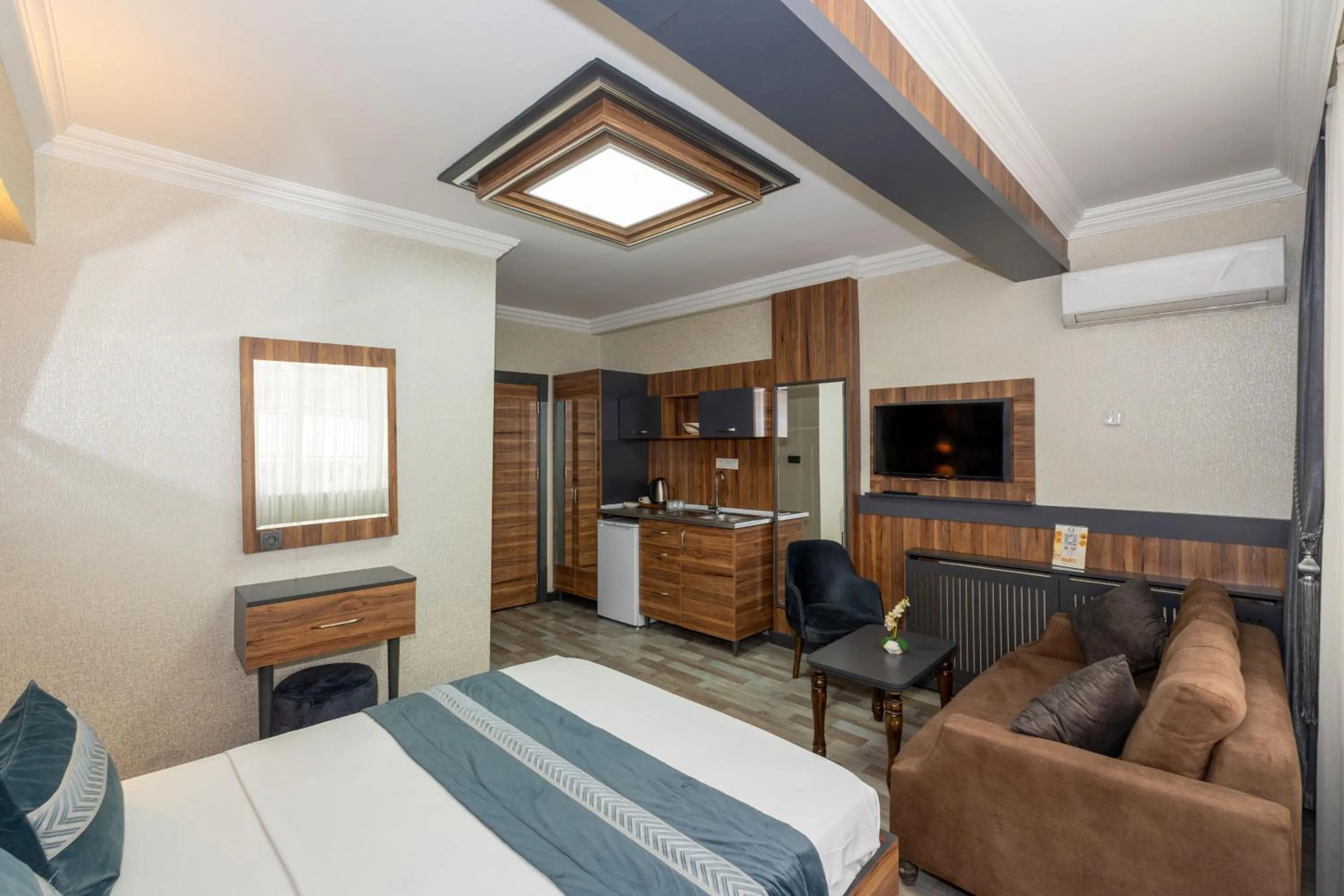 Bed in La Serena Taxim Hotel