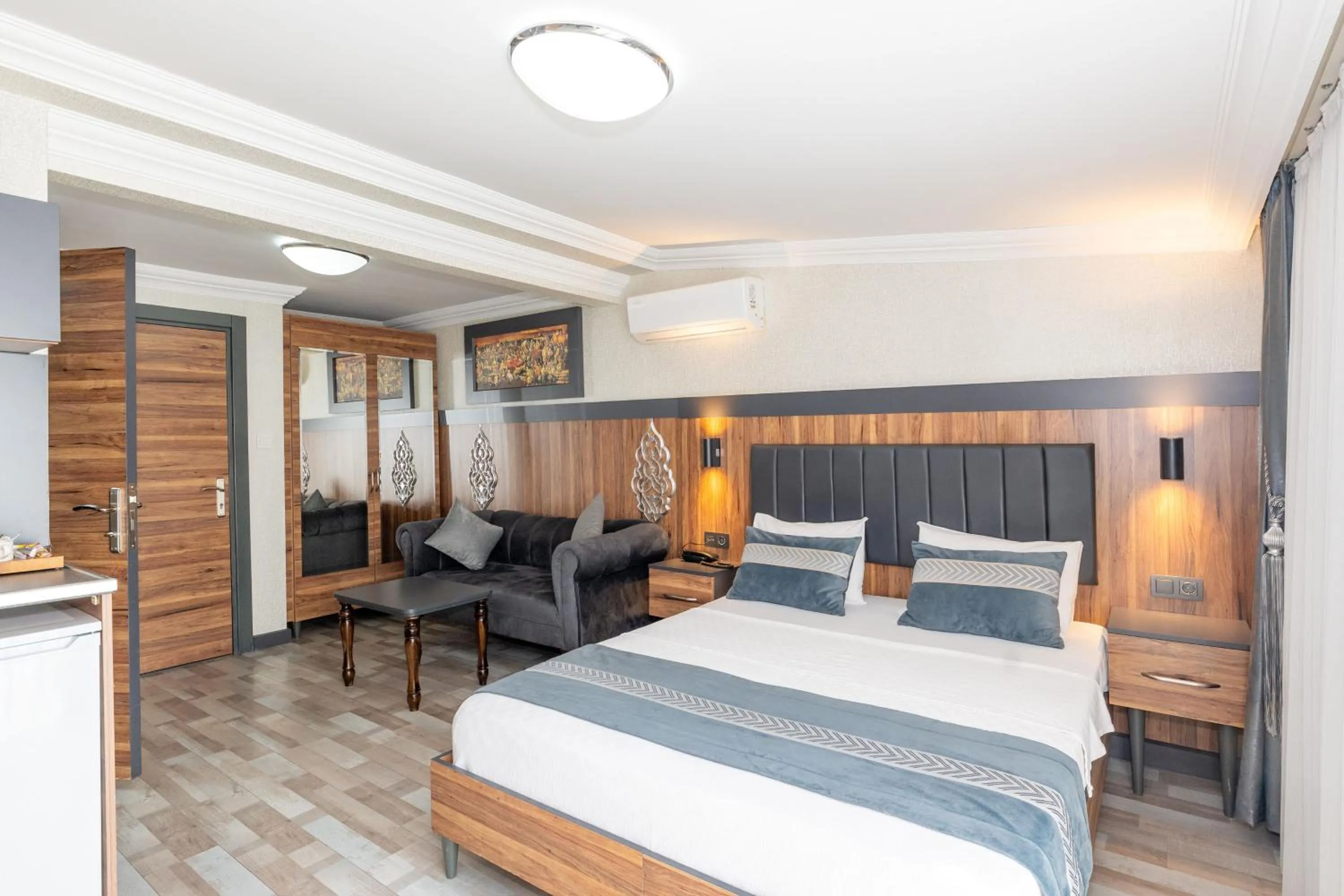 Bed in La Serena Taxim Hotel