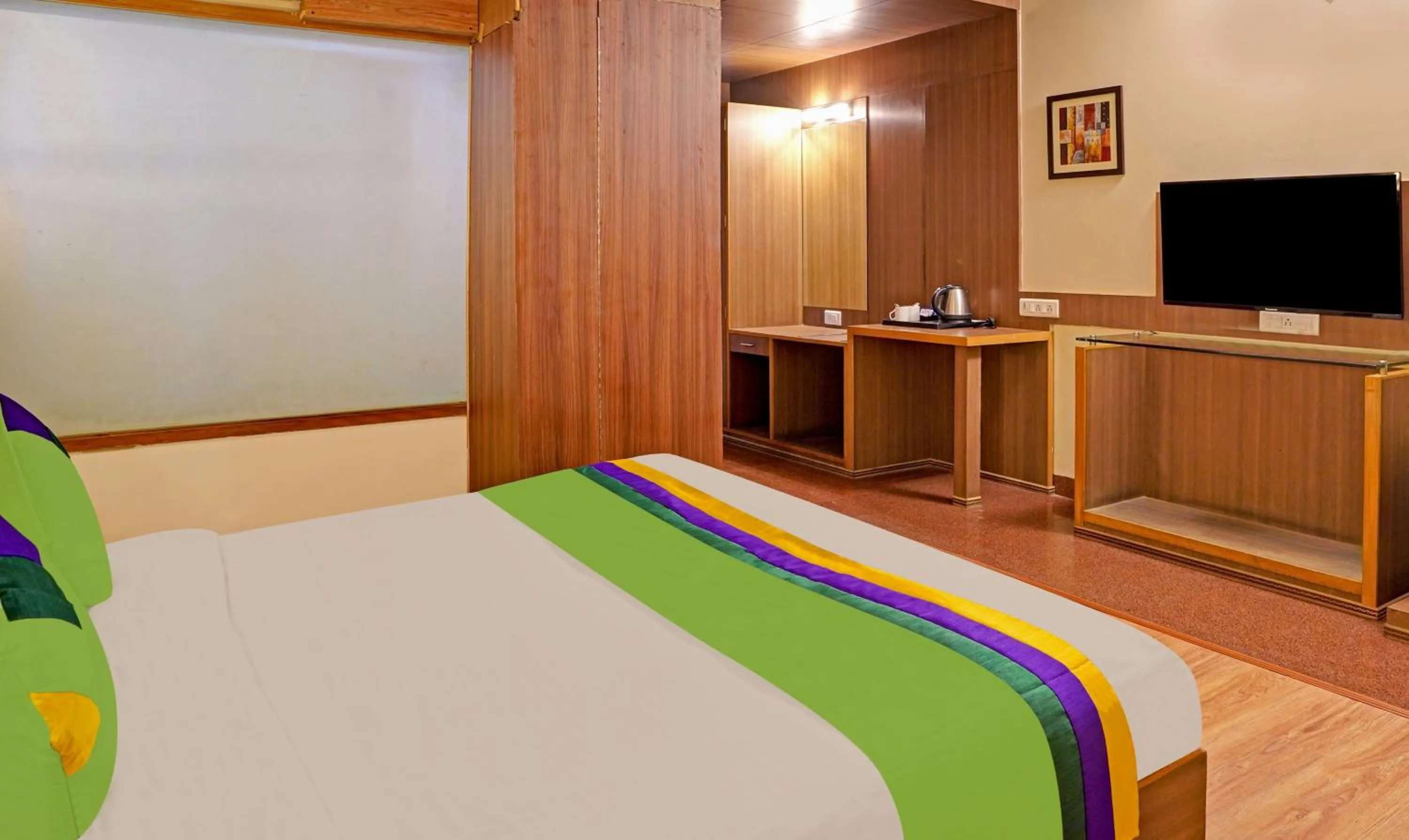 Bedroom, Bed in Treebo Royal Cm - City Center