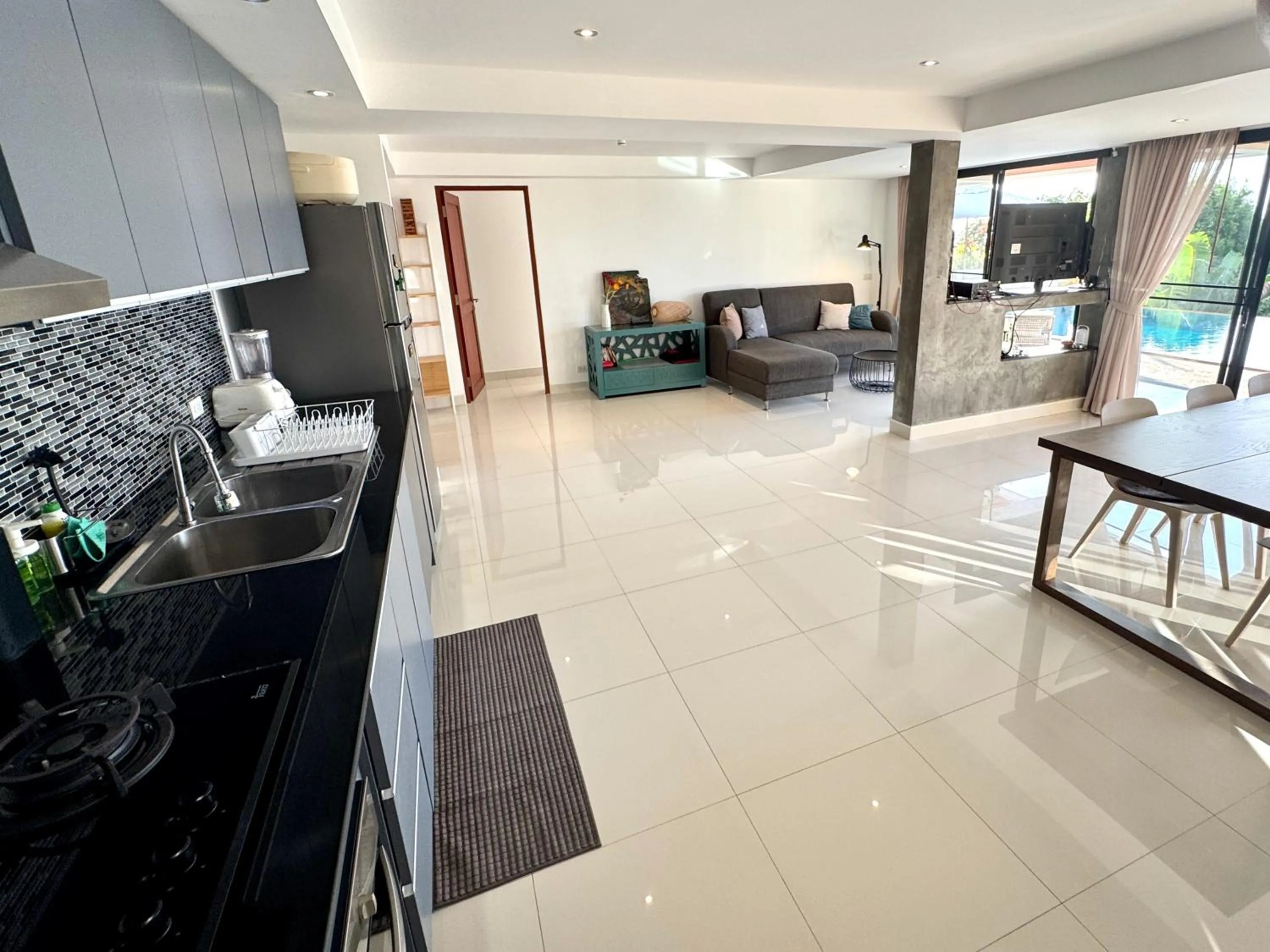 Kitchen or kitchenette in The Carma - stylish and luxury sea view pool villa