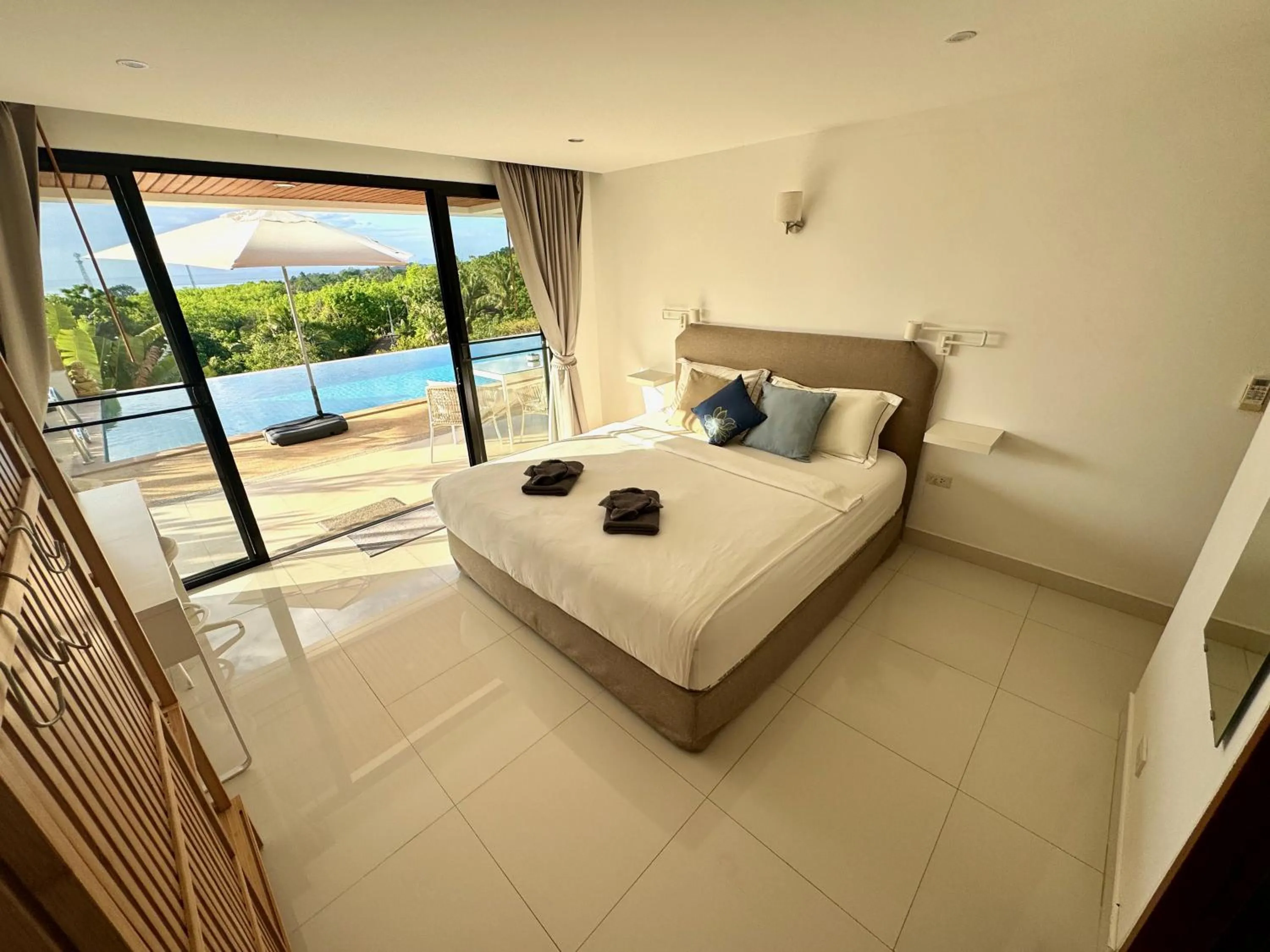Bed in The Carma - stylish and luxury sea view pool villa