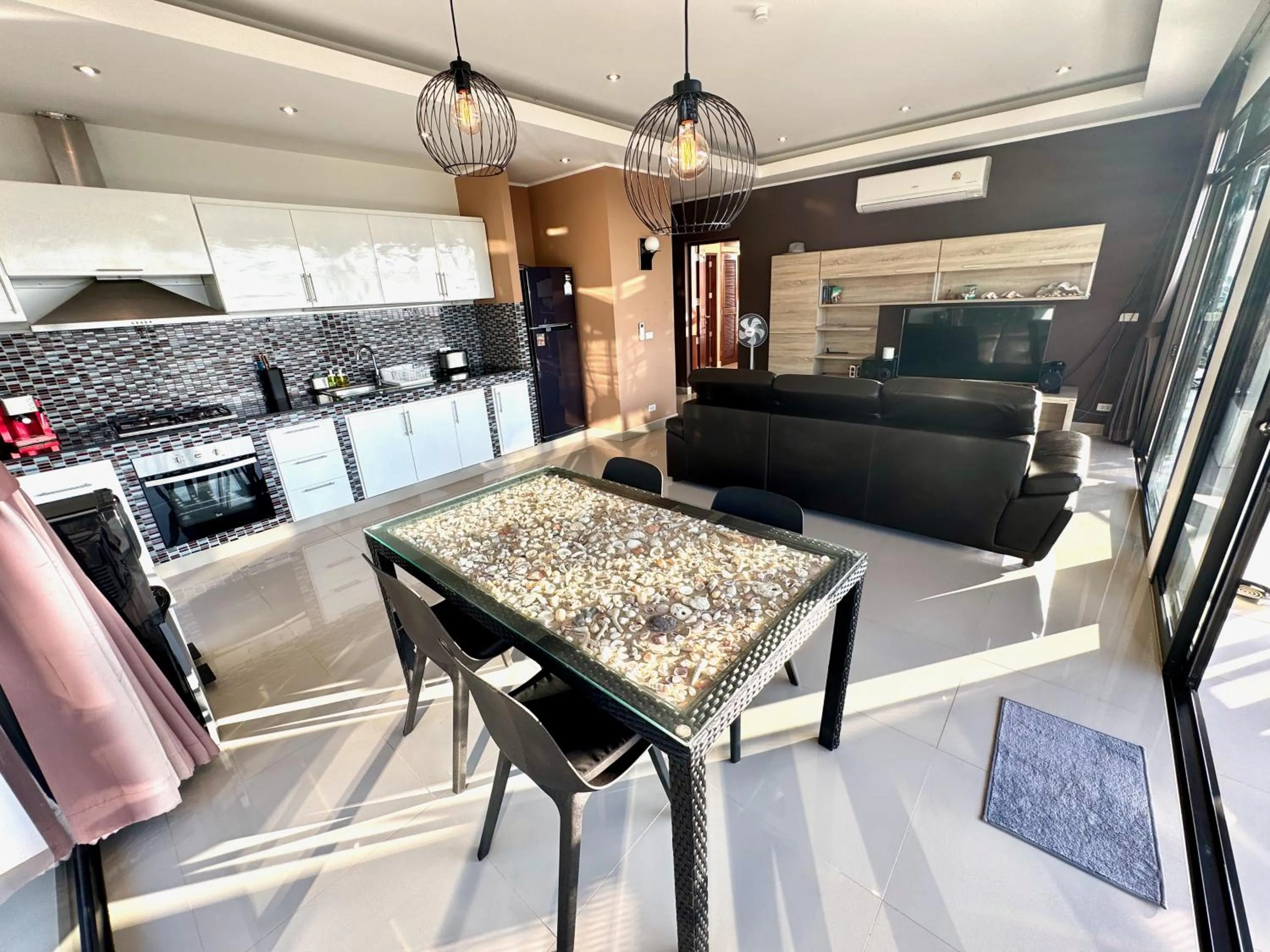 Kitchen or kitchenette in The Carma - stylish and luxury sea view pool villa