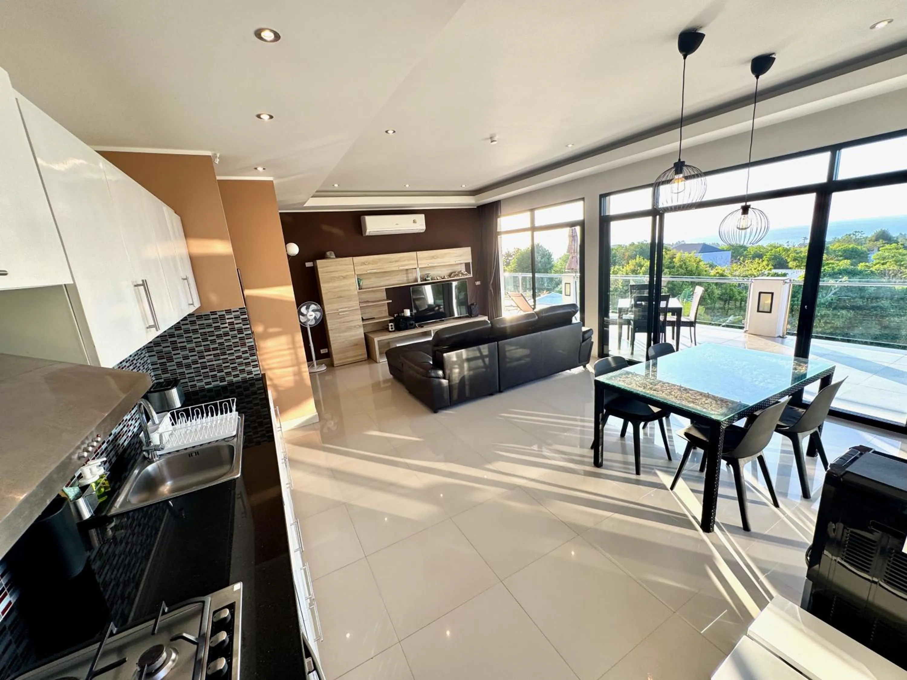 Kitchen or kitchenette in The Carma - stylish and luxury sea view pool villa