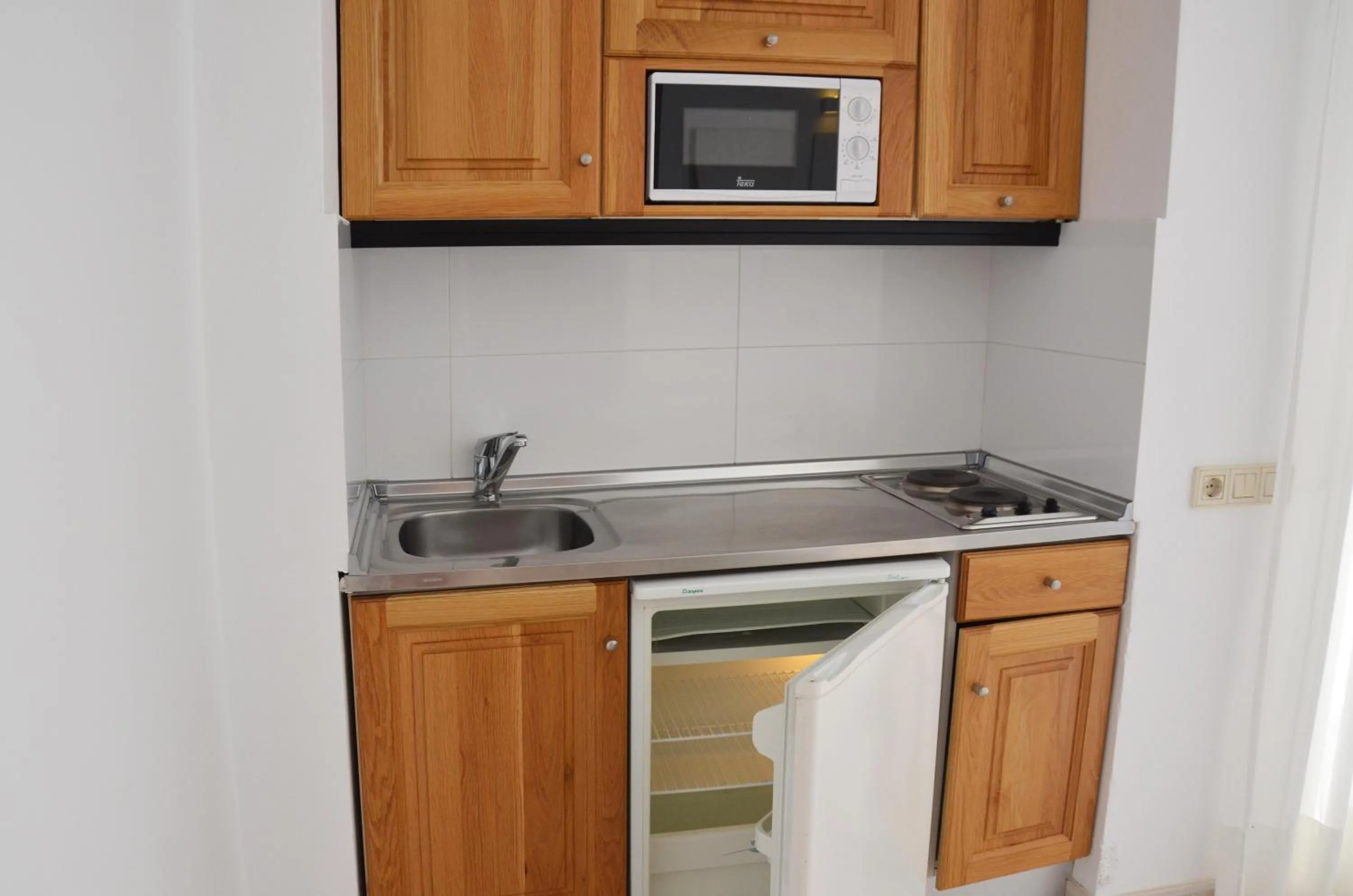 Kitchen or kitchenette in Apartamentos Vibra Panoramic