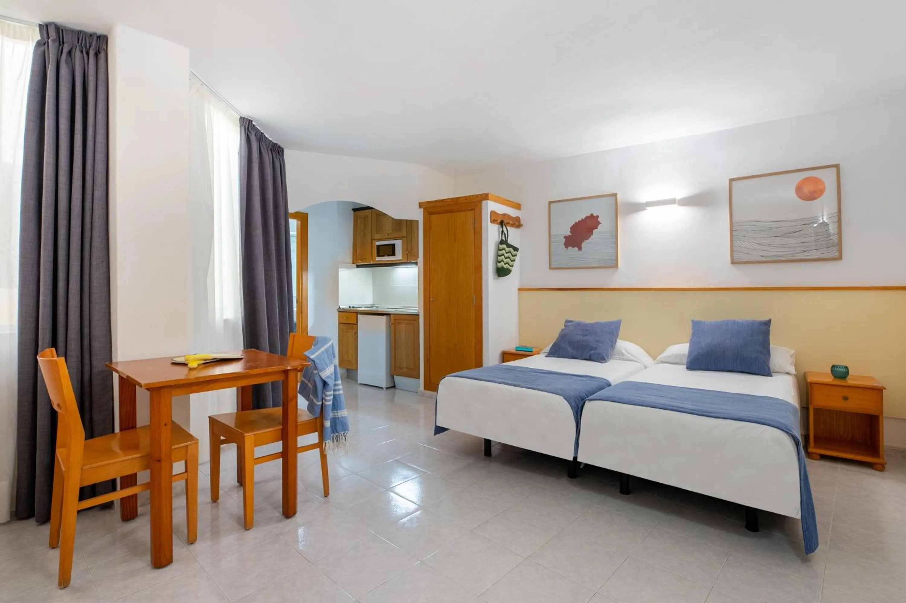 Photo of the whole room in Apartamentos Vibra Tropical Garden