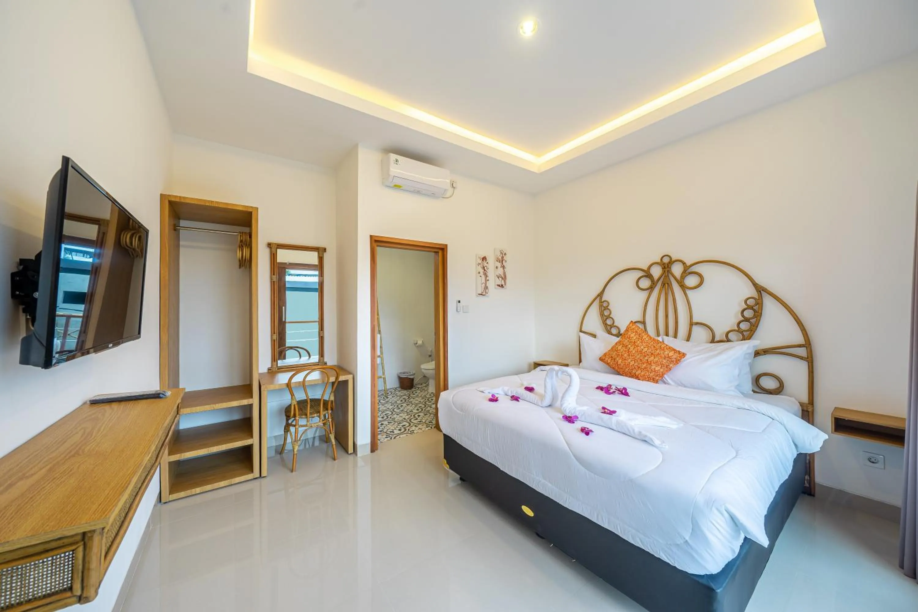 Bed in Kasmaran Bali Guest House