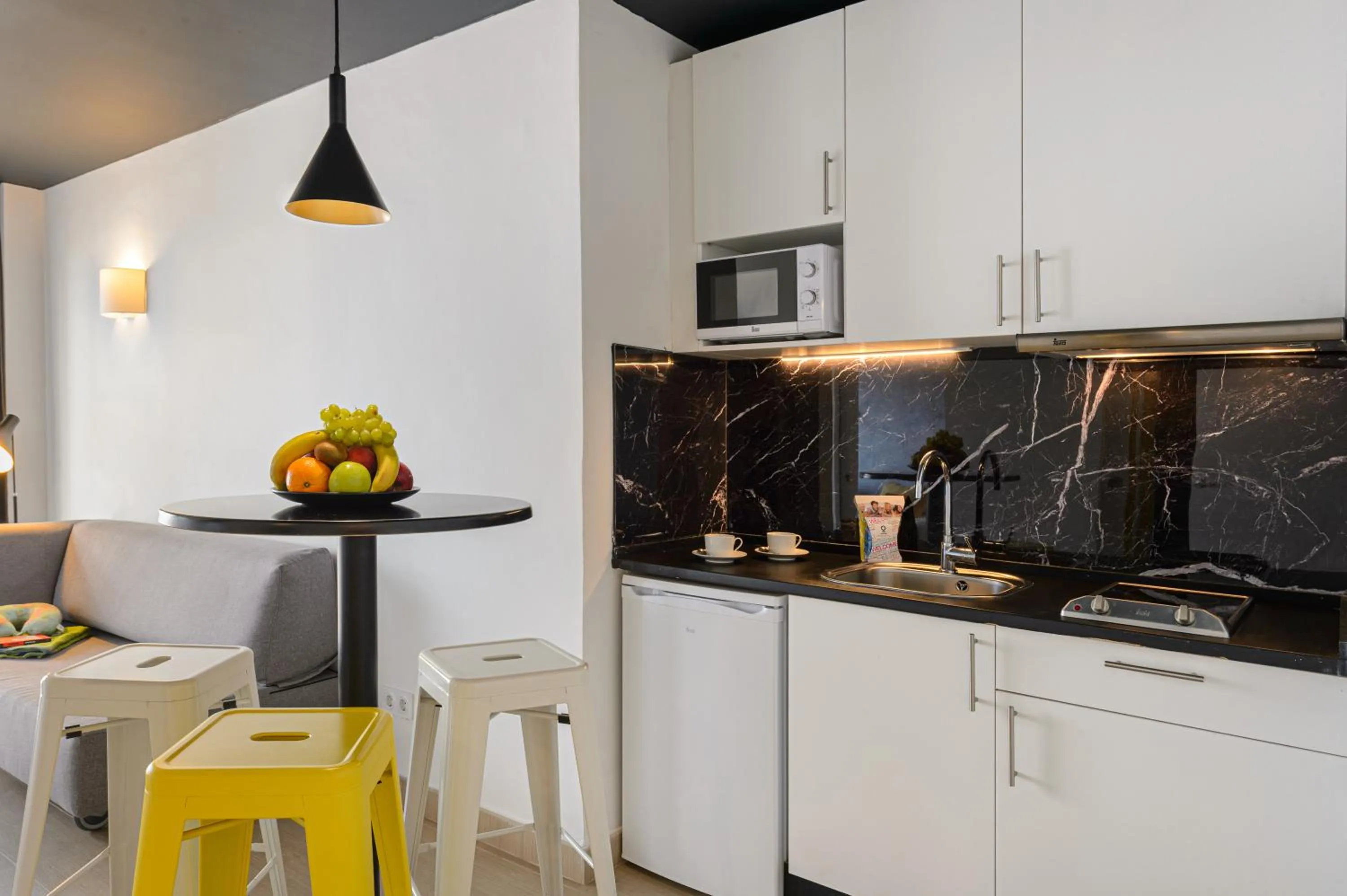 Kitchen or kitchenette in Apartamentos Vibra Jabeque Dreams