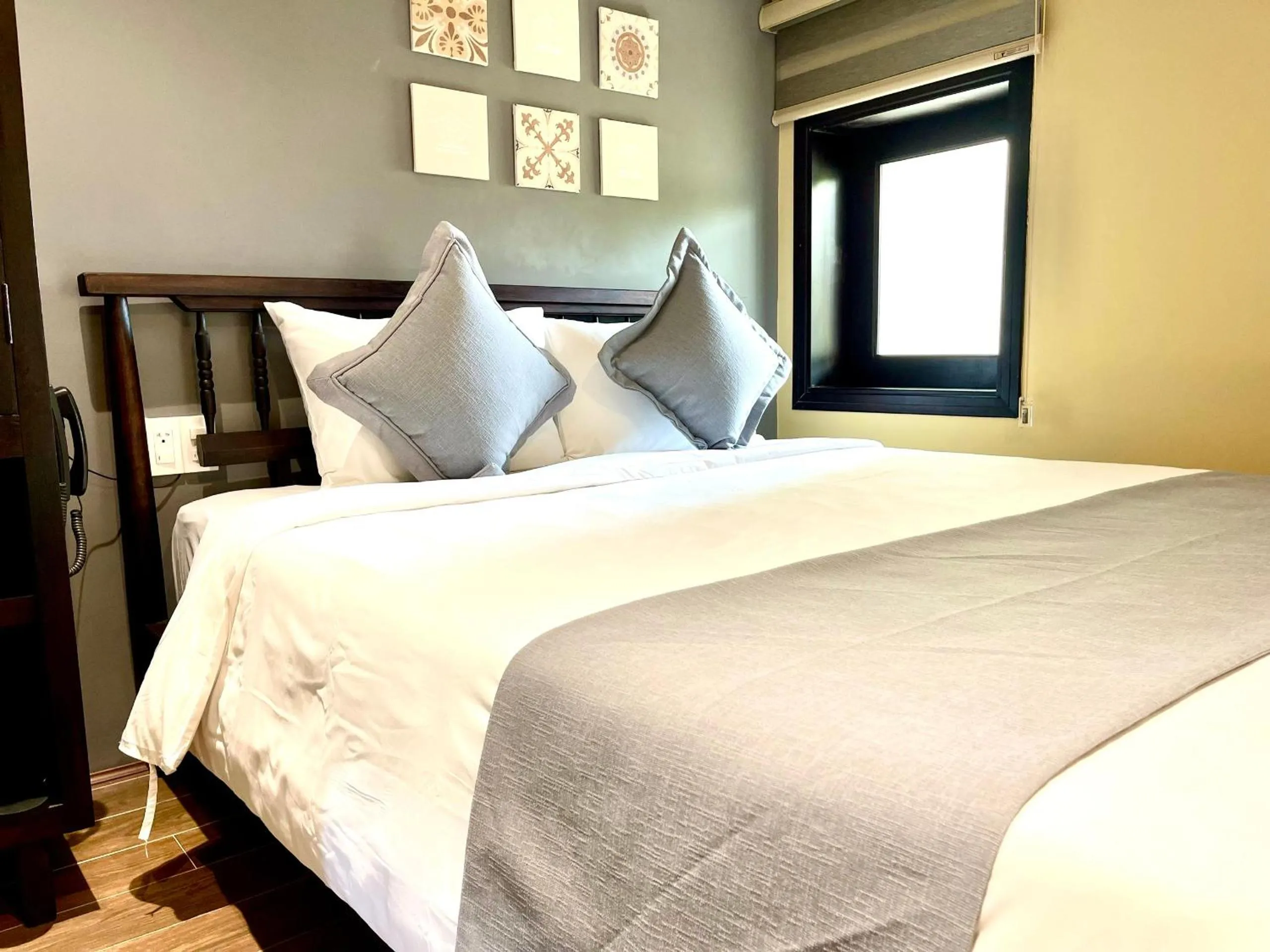 Bed in Hoianan Boutique Hotel