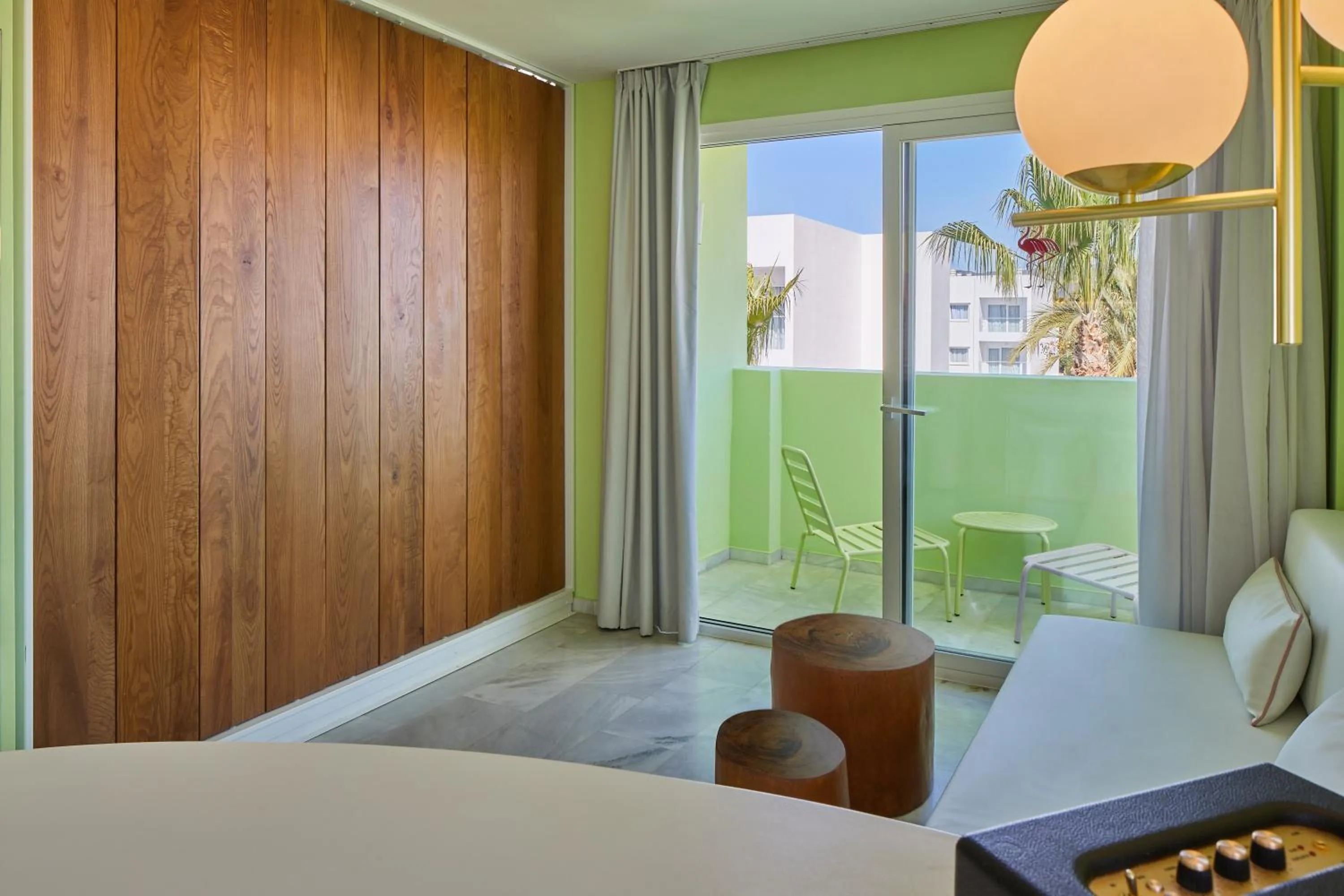 Living room, Bed in Tropicana Ibiza Suites - Adults Only