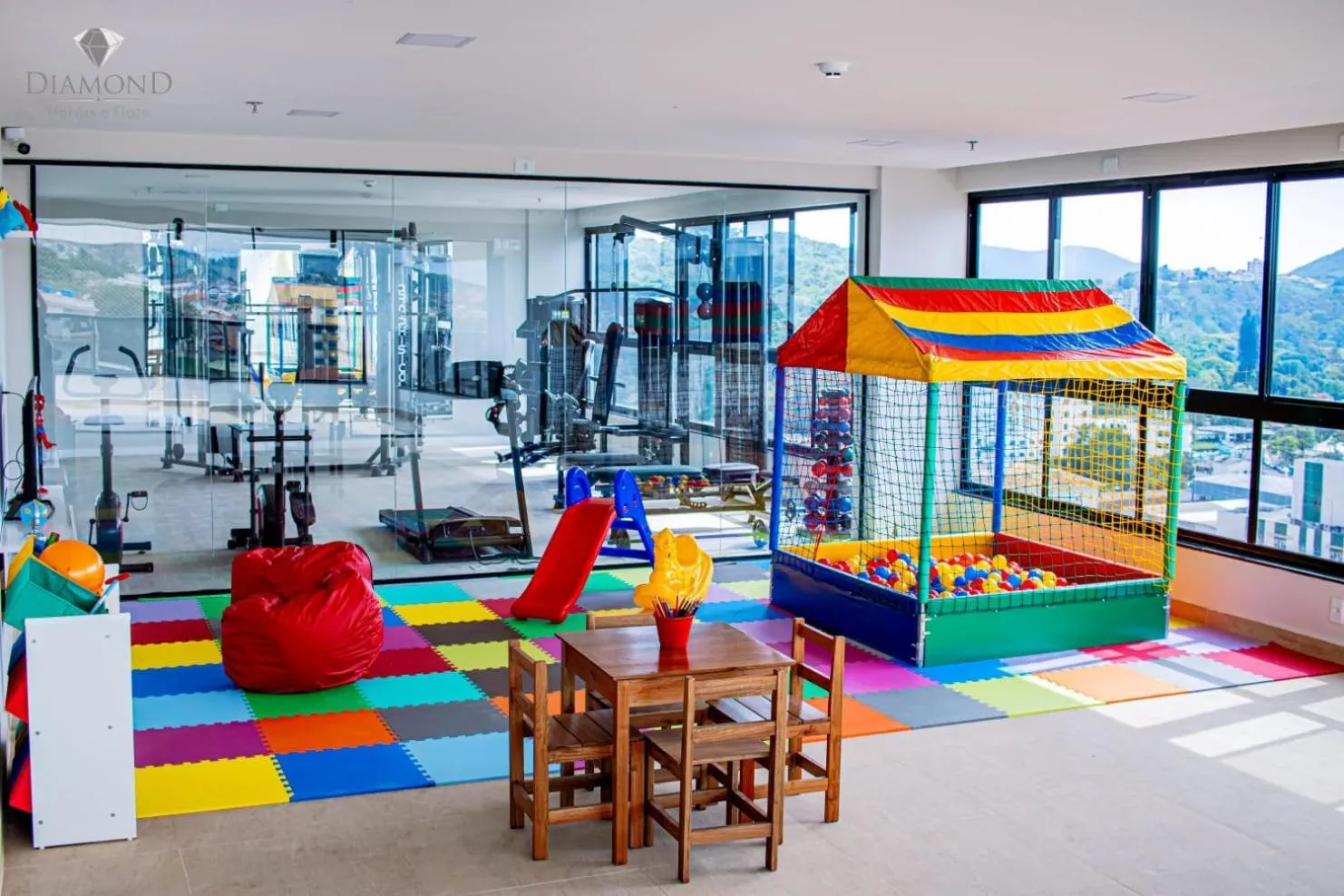 Communal lounge/ TV room in Diamond Hotéis e Flats