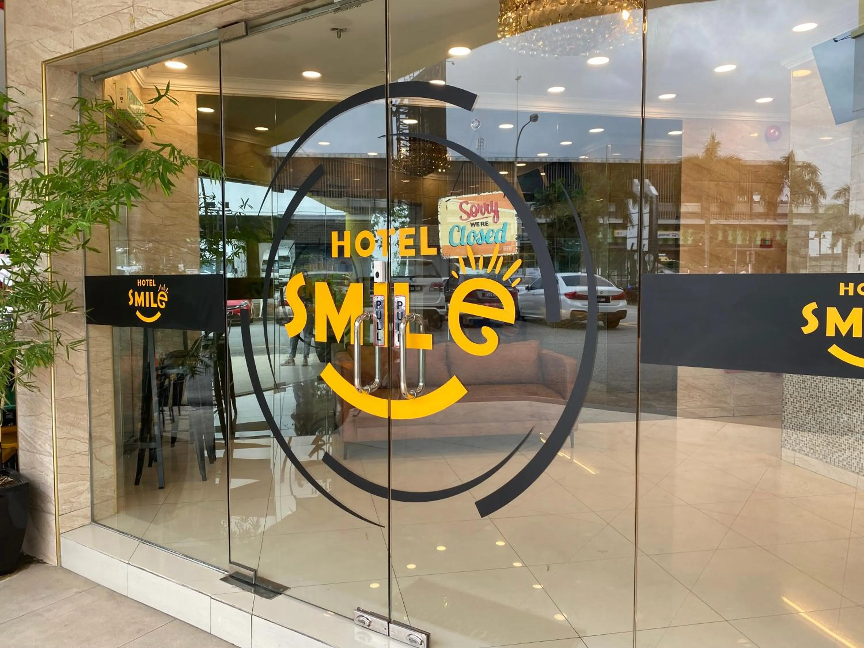 Property logo or sign in Smile Hotel Serdang South City