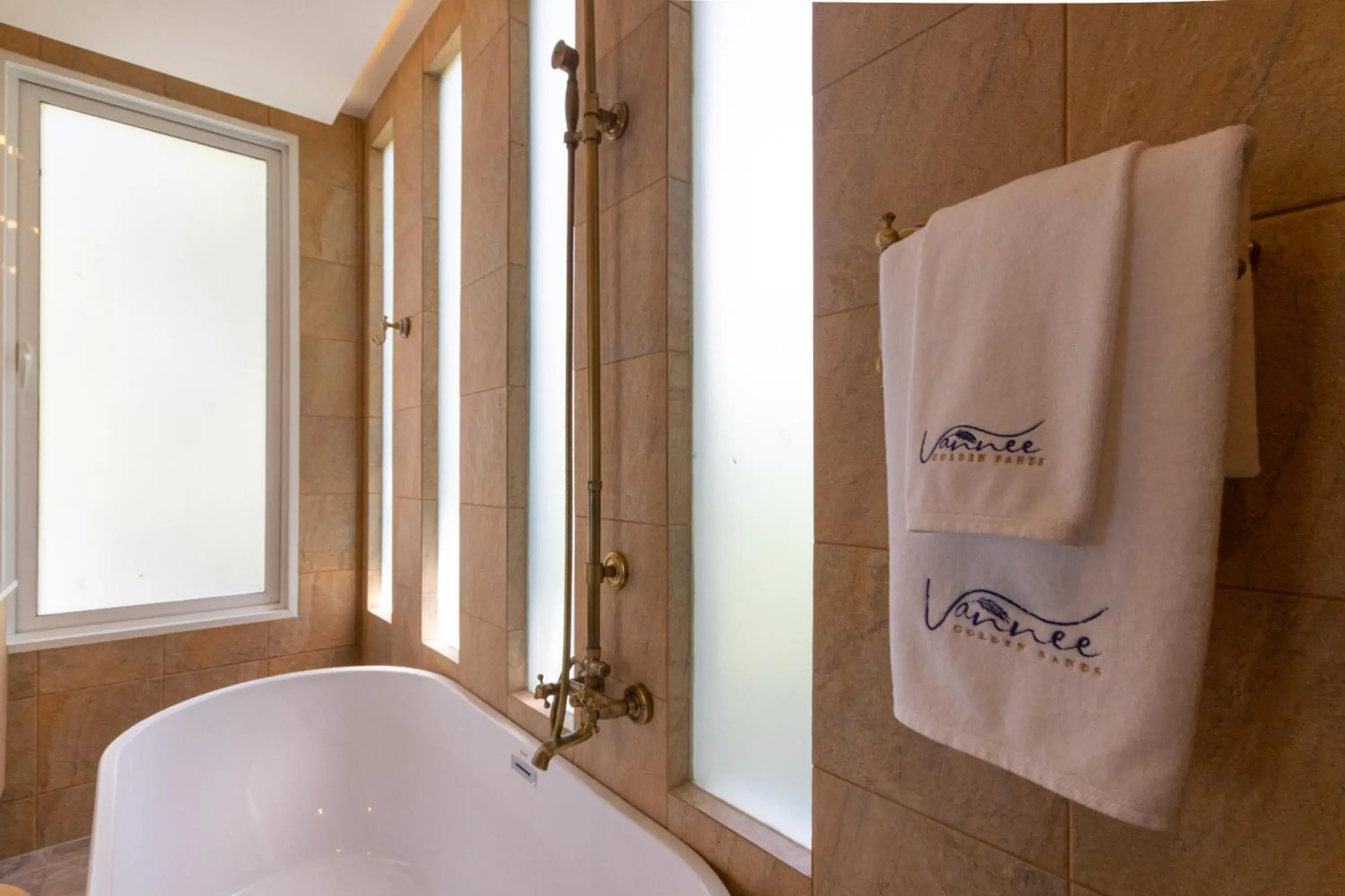Bathroom in Vannee Golden Sands Beachfront Resort Bathroom in Vannee Golden Sands Beachfront Resort