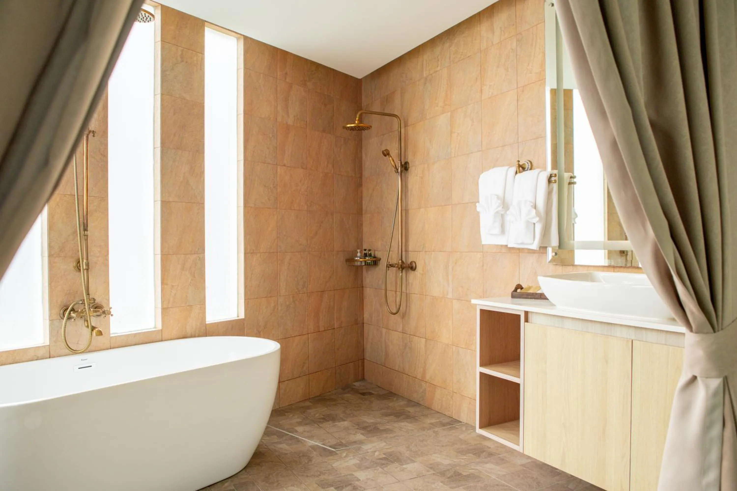 Bathroom in Vannee Golden Sands Beachfront Resort
