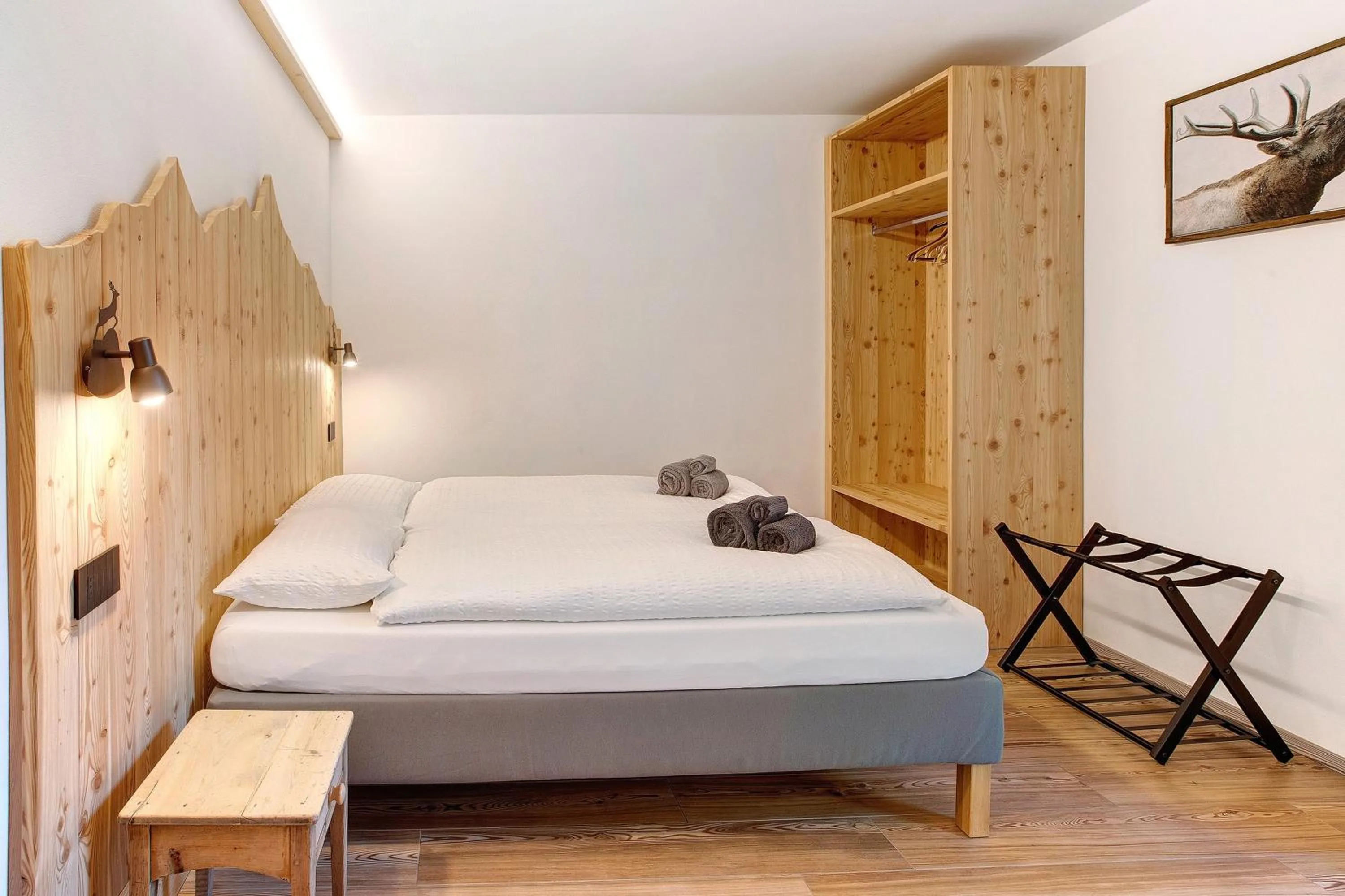 Living room, Bed in Olympic Chalet 11