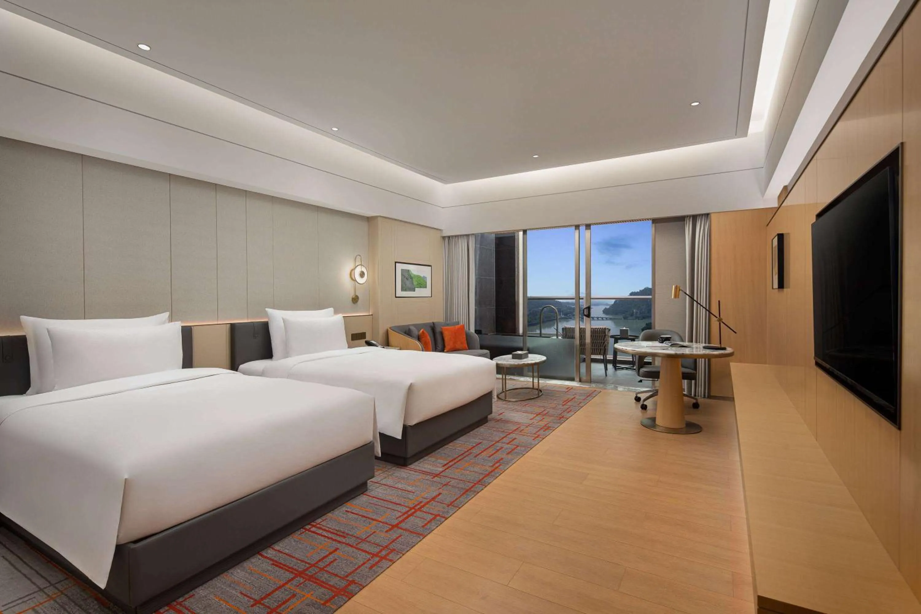 Photo of the whole room, Bed in Wyndham Grand Zhaoqing Downtown