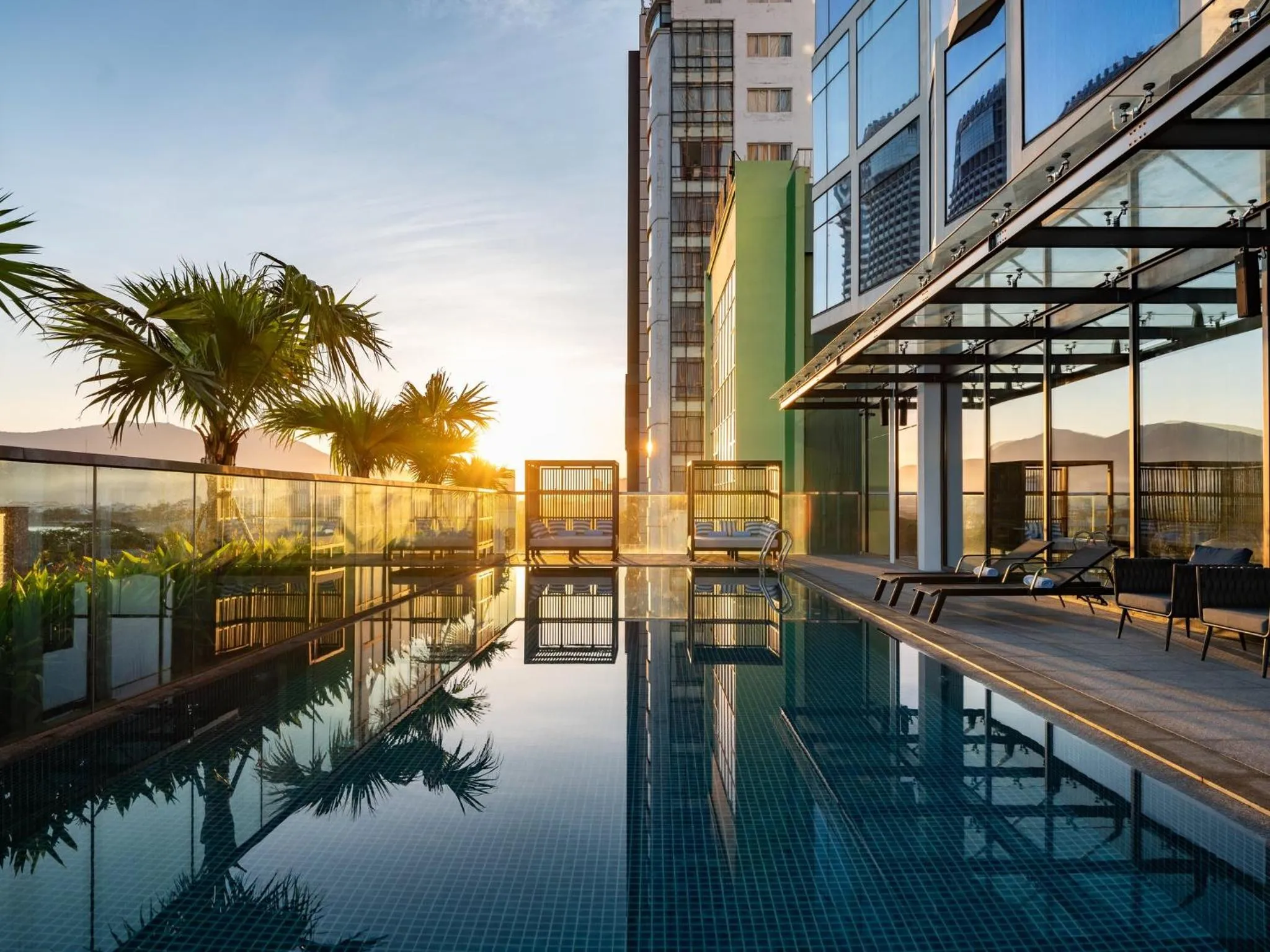 Swimming pool in Crowne Plaza Danang City Centre by IHG