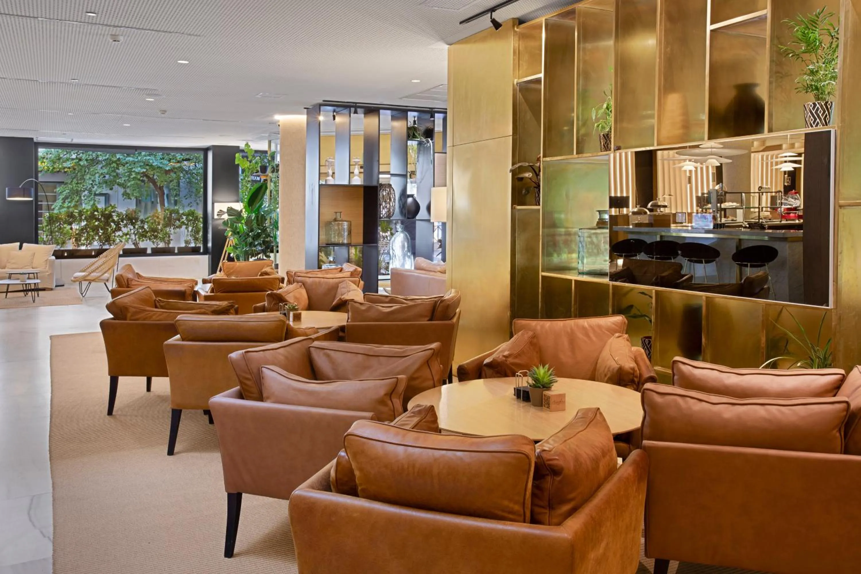 Lobby or reception in Melia Madrid Serrano