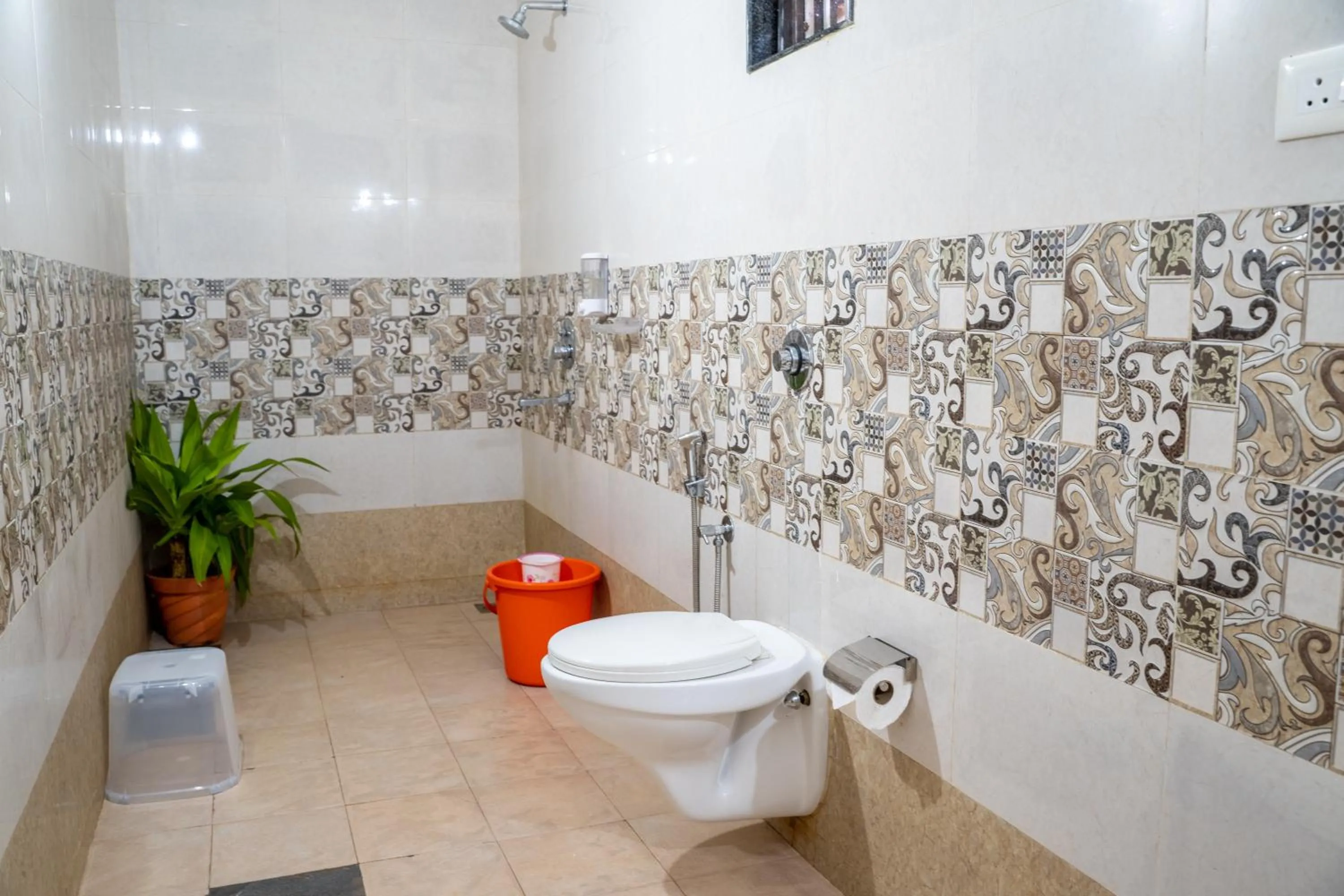 Shower in DhanRains Moonlight Retreat Cottages