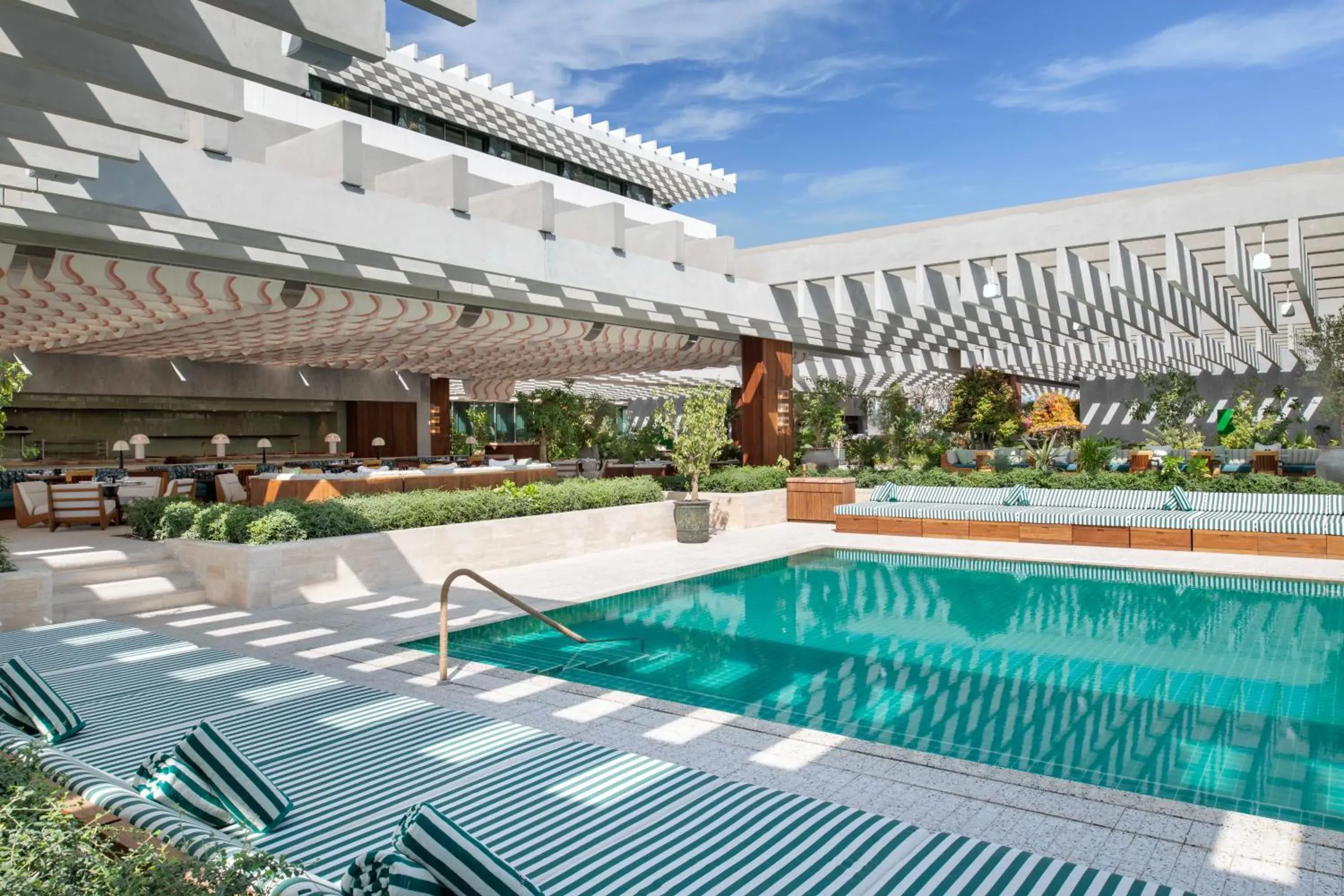 Swimming pool in The Ned Doha Swimming pool in The Ned Doha