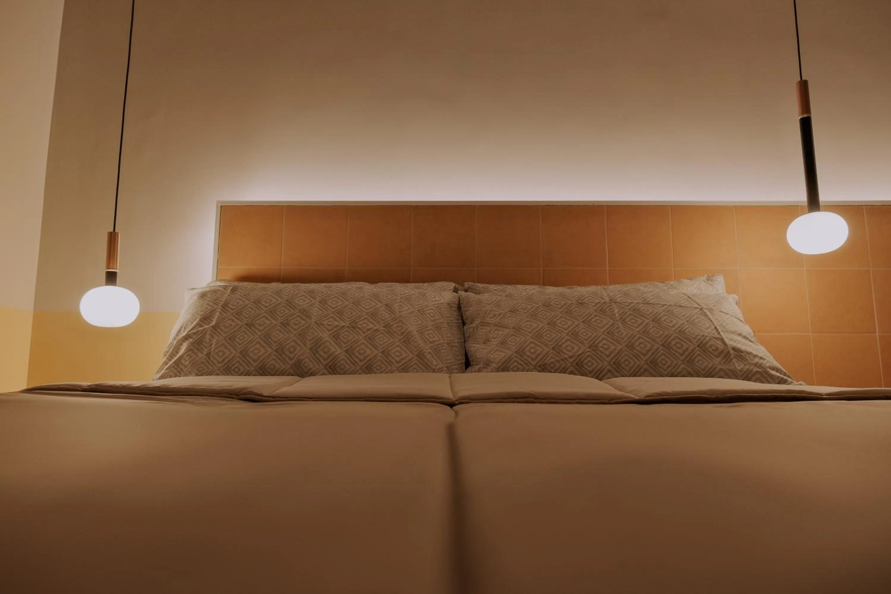 Bed in Occhi di Napoli Experiential Relais