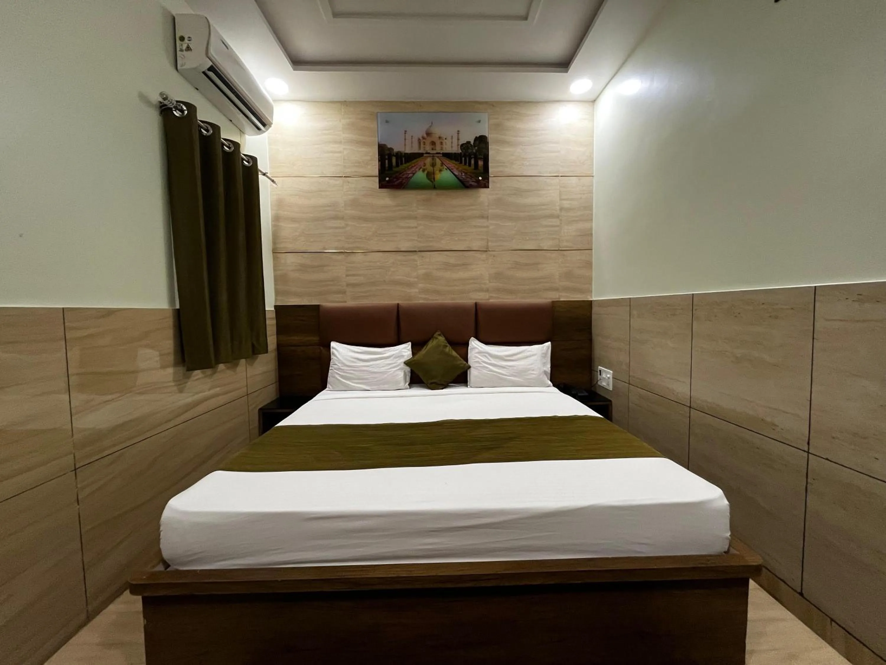 Bedroom, Bed in Taj Nice Point Manage by Taj Sunrise Group