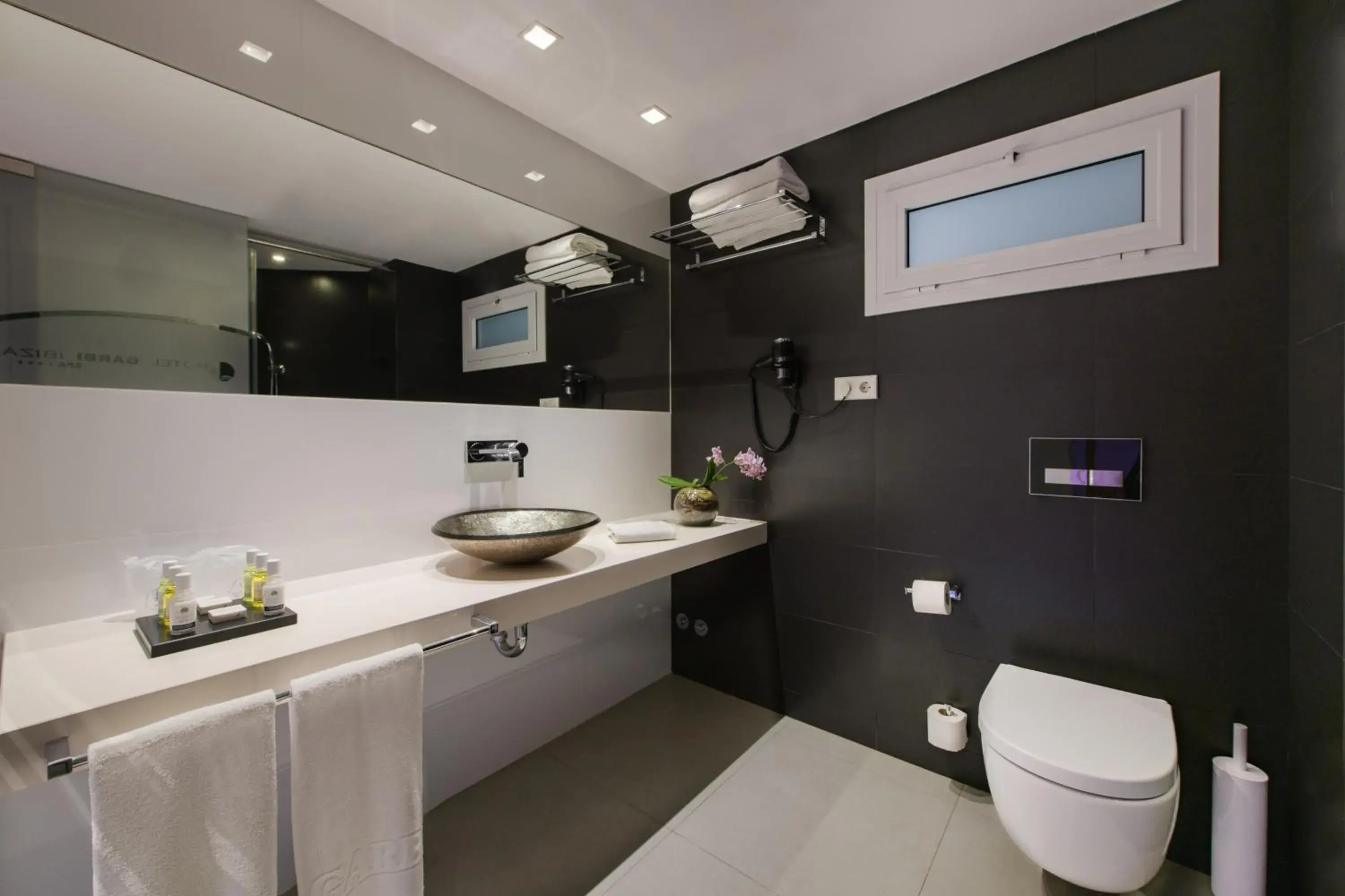 Bathroom in Hotel Garbi Ibiza & Spa Bathroom in Hotel Garbi Ibiza & Spa