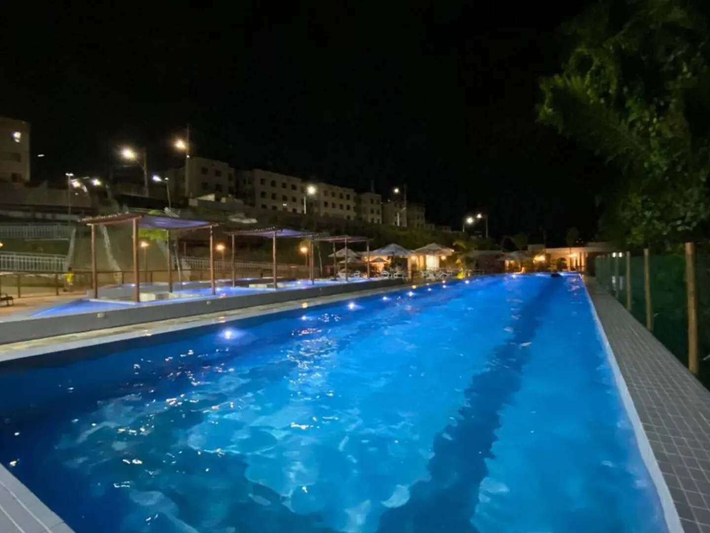 Swimming pool in Mirantes 59 Apto próximo à Ponta Negra e Cotovelo
