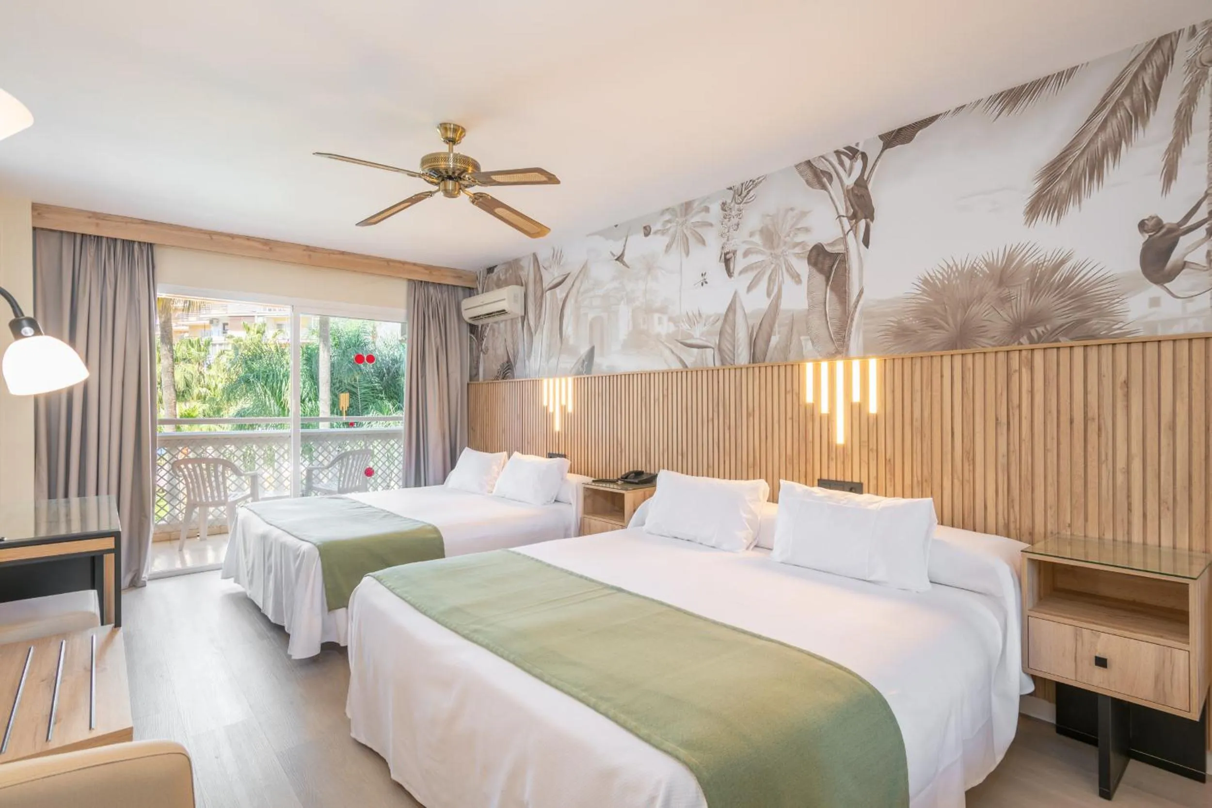 Bed in Hotel Parasol by Dorobe