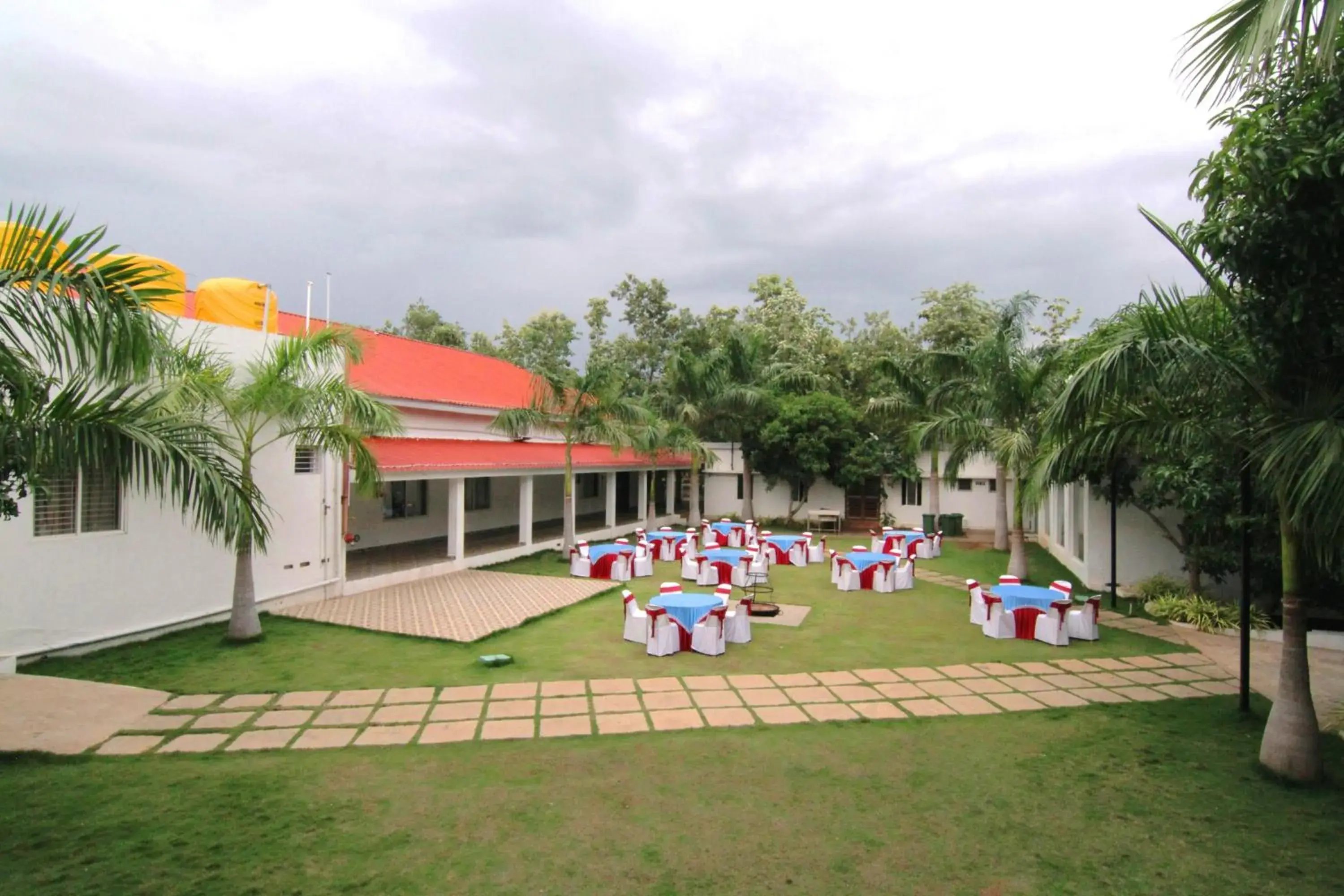 Property building in Reva Resorts and Holiday Homes Property building in Reva Resorts and Holiday Homes