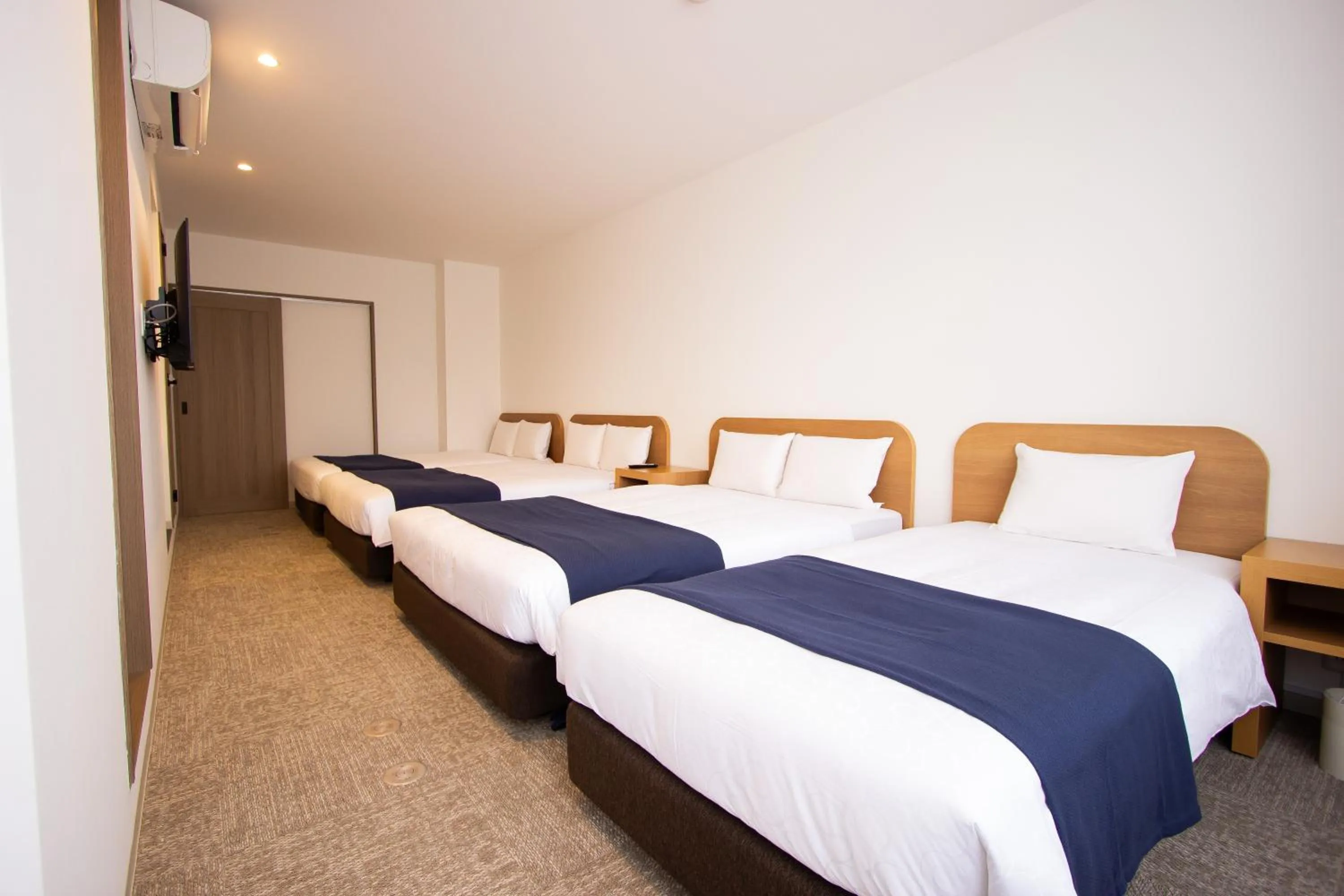 Bedroom, Bed in HIRO BUILDING Apartment Stay