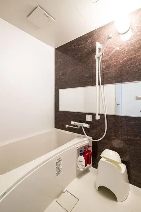 Bathroom in HIRO BUILDING Apartment Stay