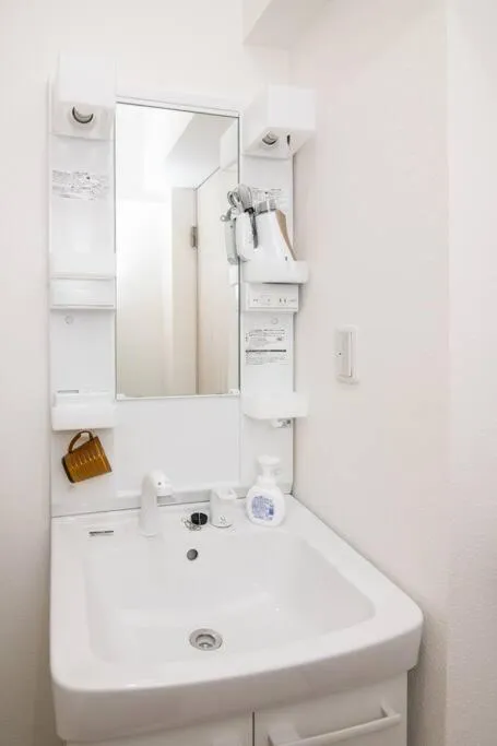 Bathroom in HIRO BUILDING Apartment Stay