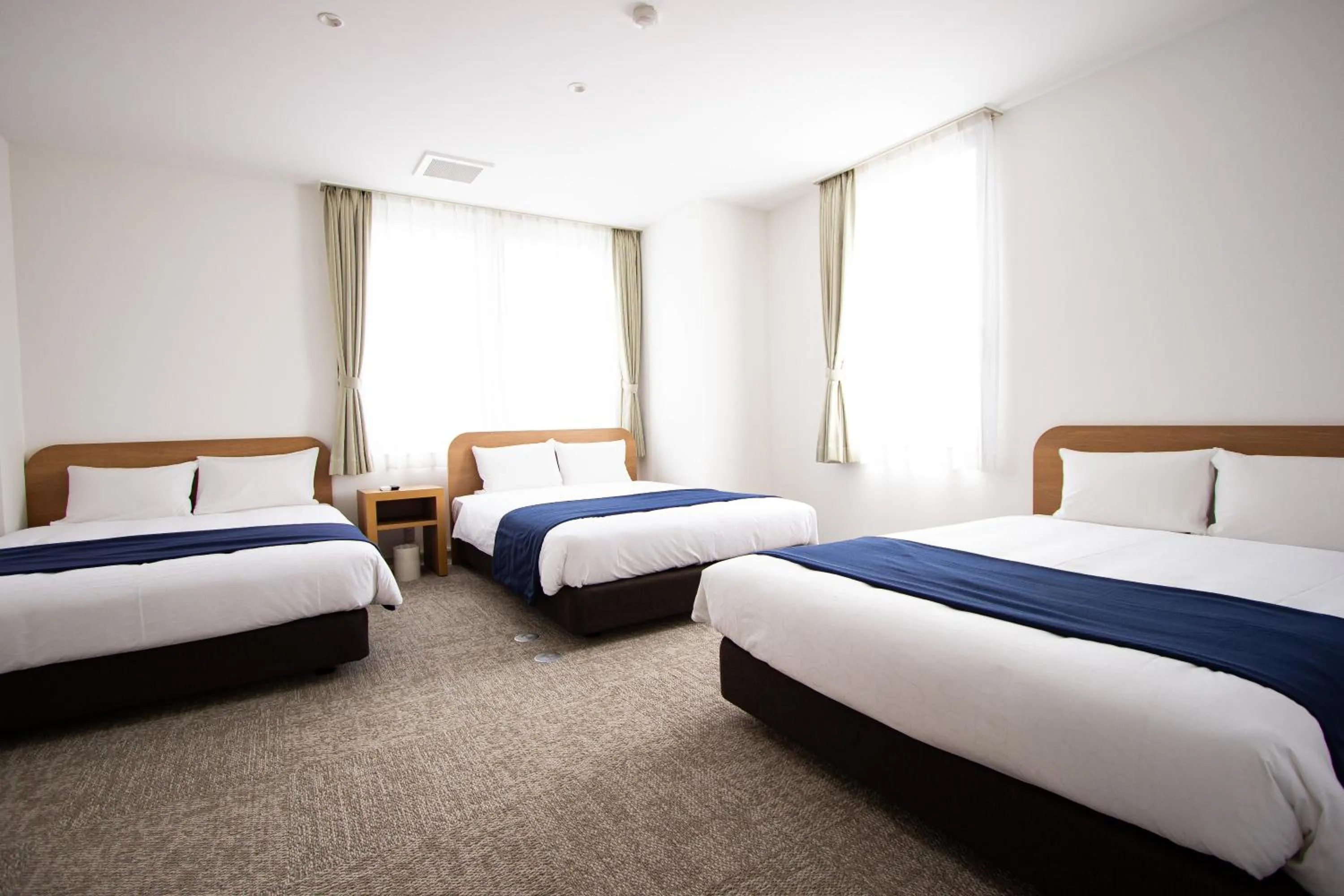 Bedroom, Bed in HIRO BUILDING Apartment Stay