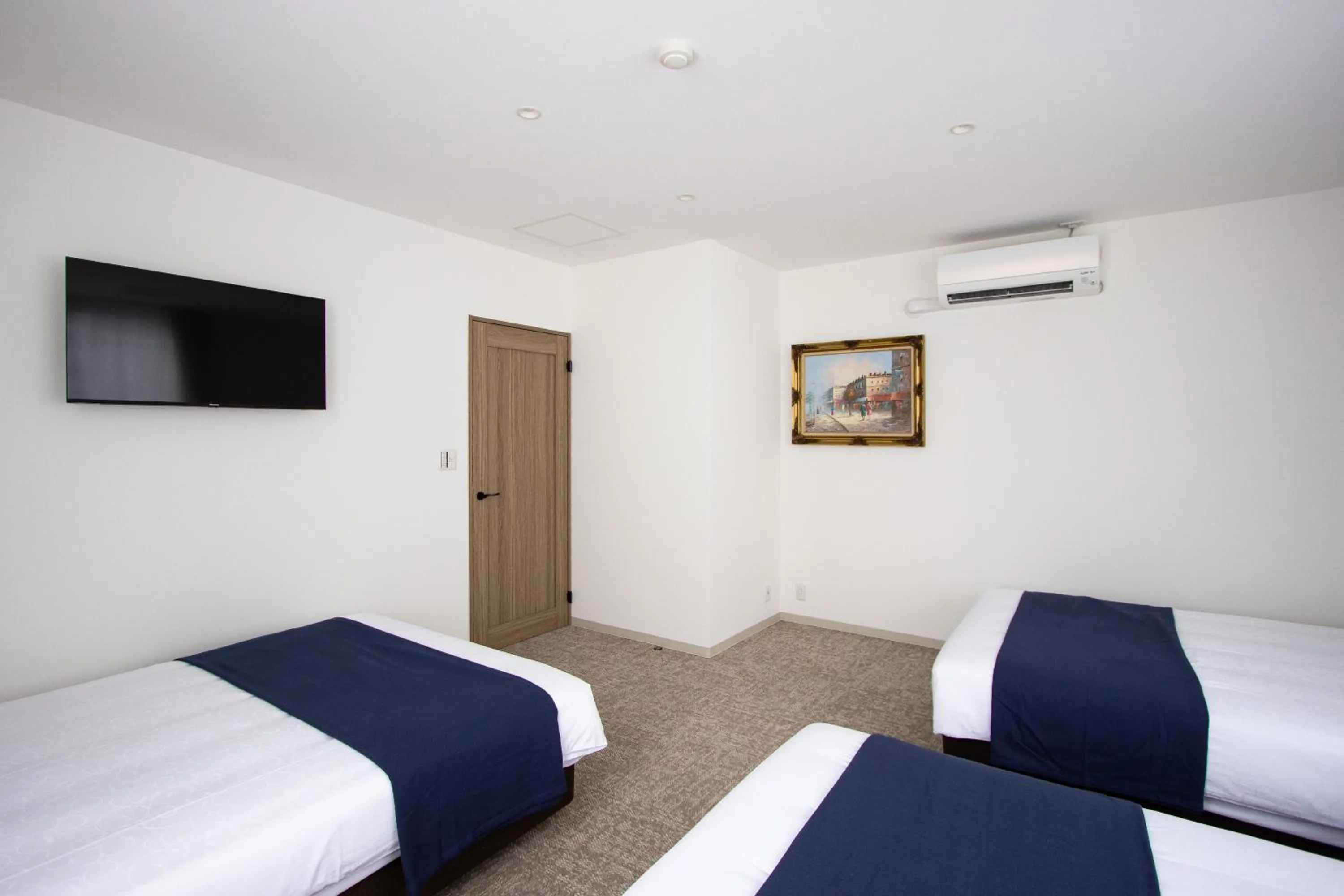 Bedroom, Bed in HIRO BUILDING Apartment Stay