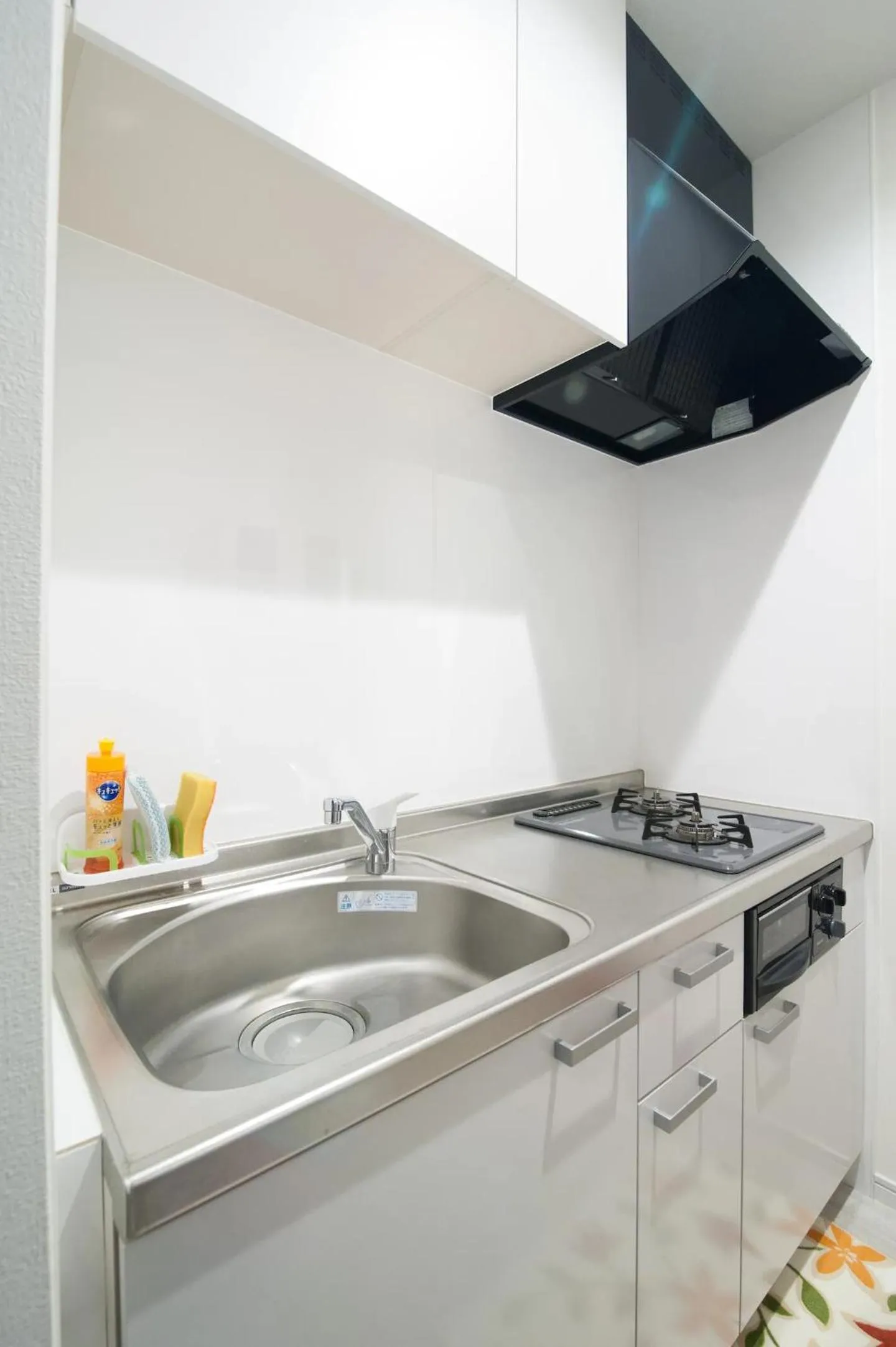 Kitchen or kitchenette in HIRO BUILDING Apartment Stay