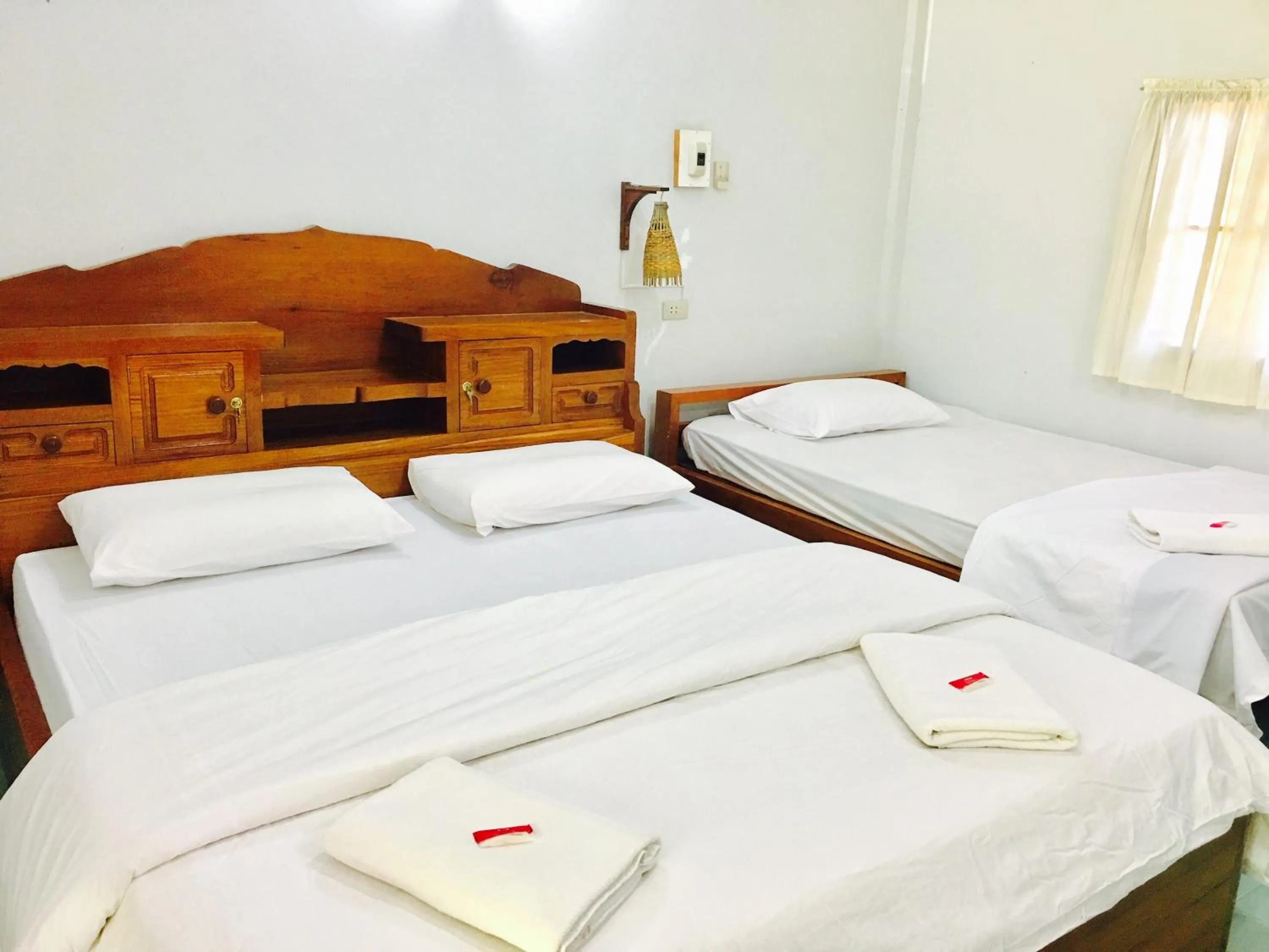 Bed in ห้วยน้ำรินรีสอร์ท The Creek Garden Resort