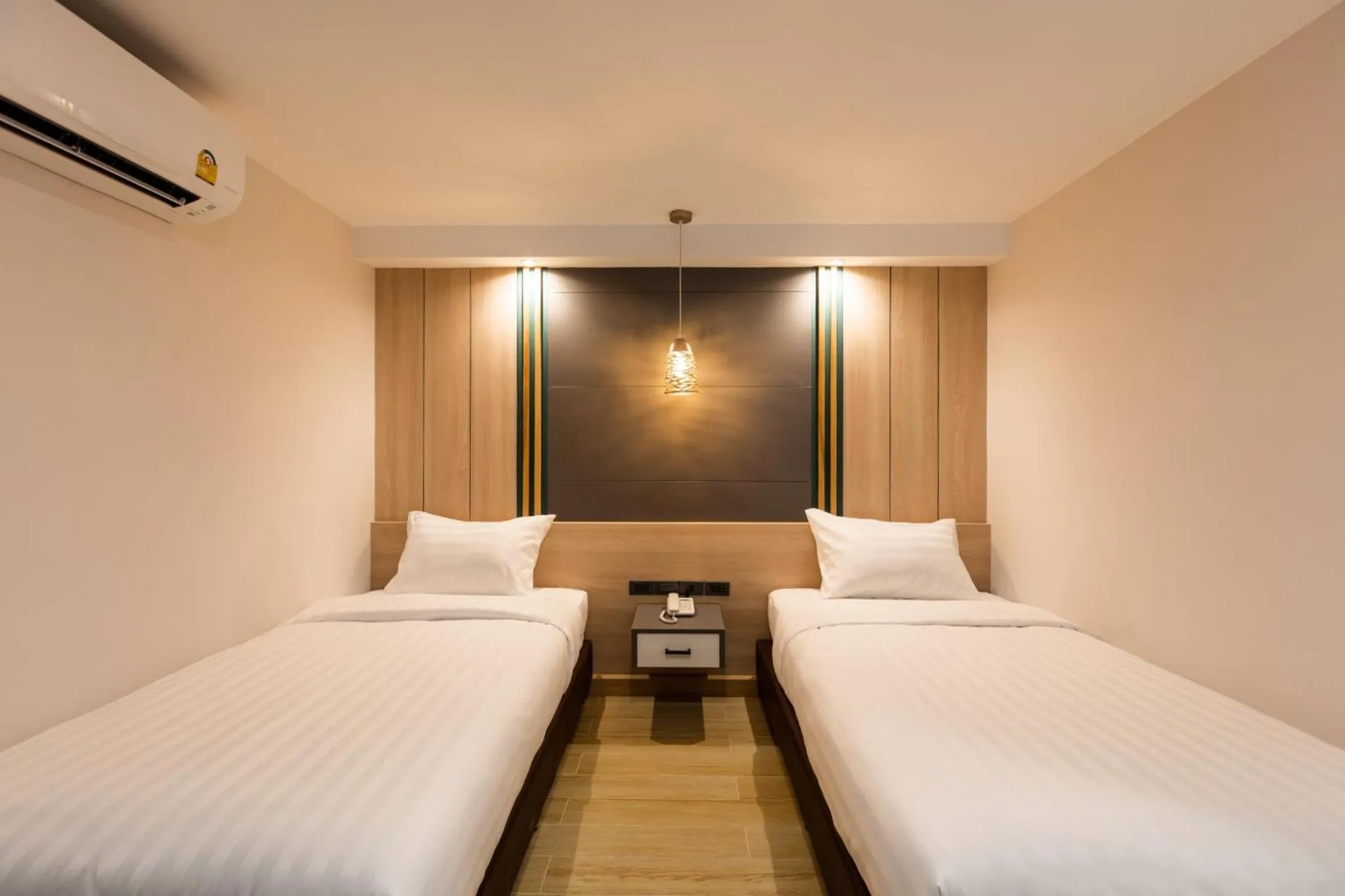 Bed in City Park Hotel Bangkok Pratunam by PCL