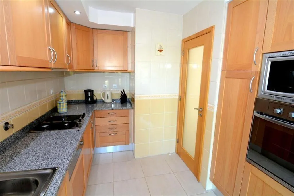 Kitchen or kitchenette in Apartamentos Primavera - Praia da Rocha