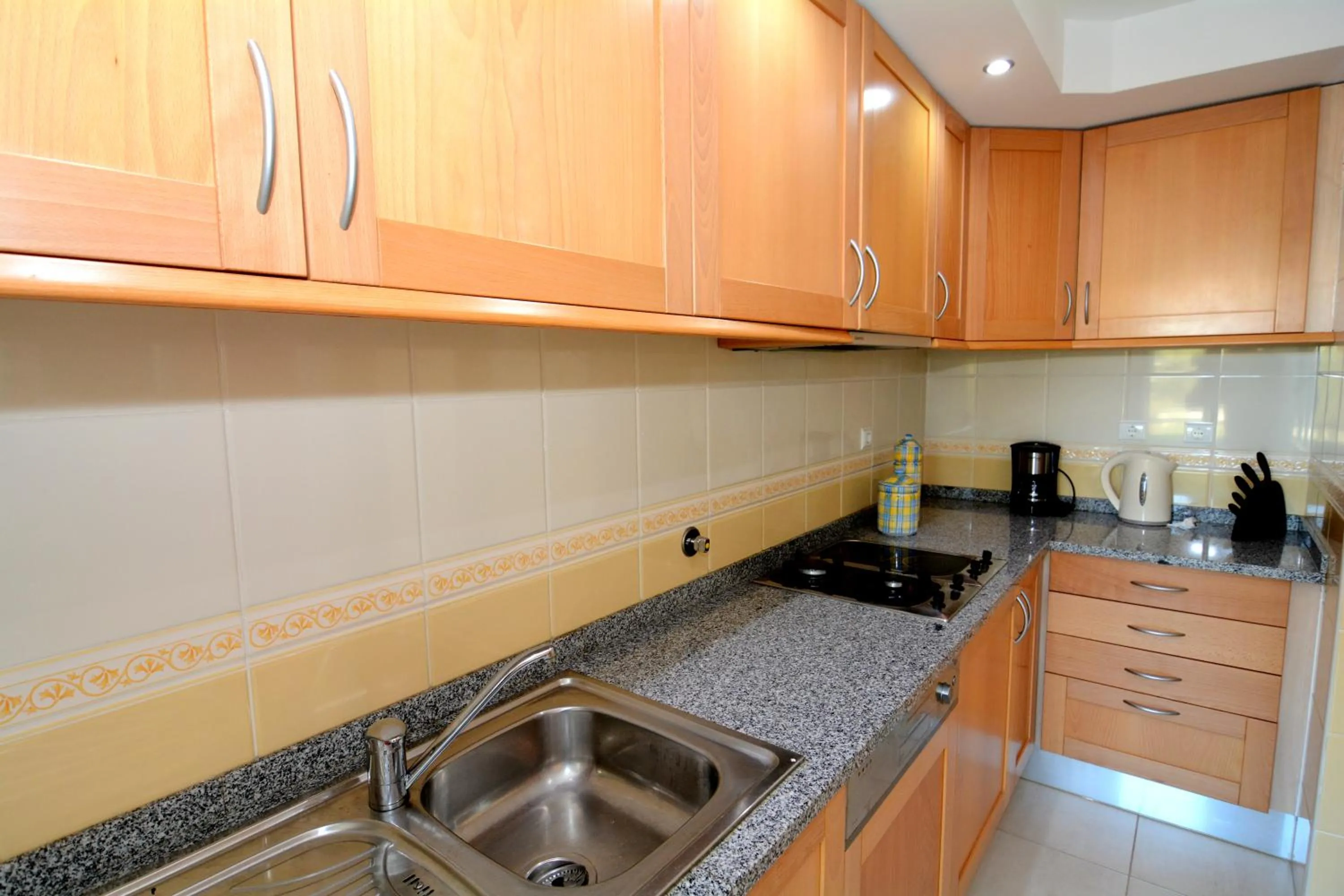 Kitchen or kitchenette in Apartamentos Primavera - Praia da Rocha