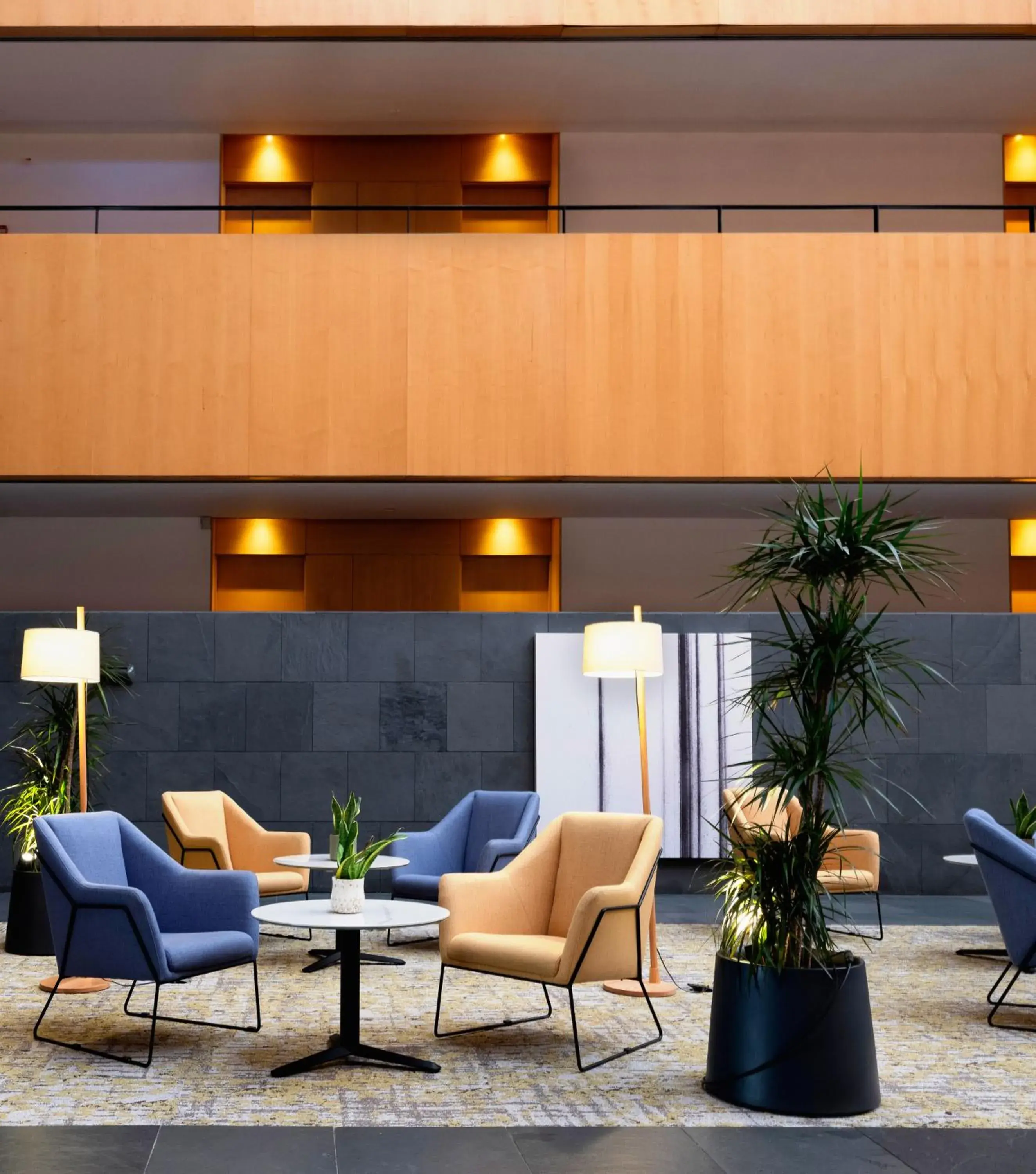 Lobby or reception in INNSiDE by Meliá Barcelona Aeropuerto Lobby or reception in INNSiDE by Meliá Barcelona Aeropuerto