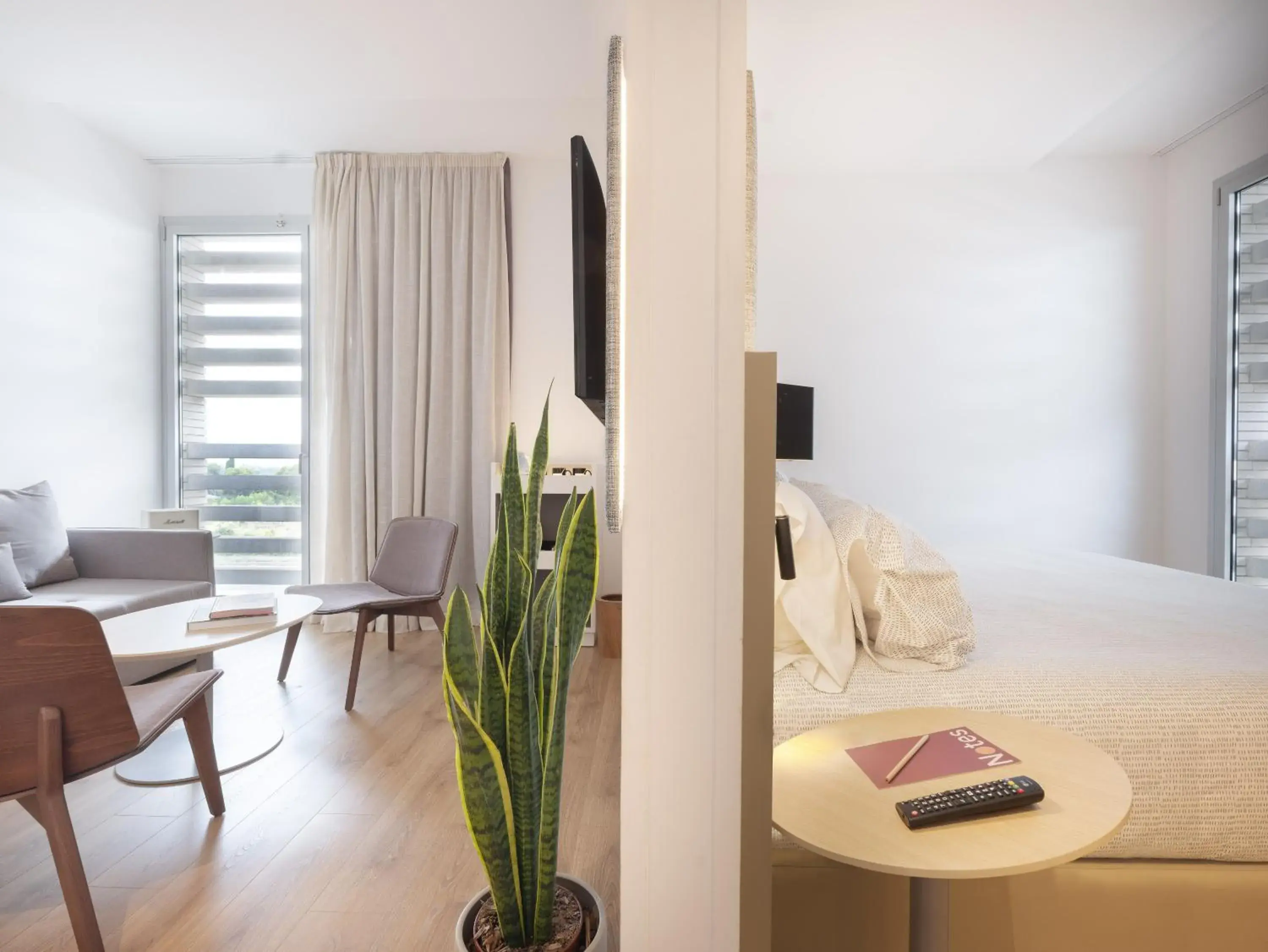 Living room, Bed in INNSiDE by Meliá Barcelona Aeropuerto Living room, Bed in INNSiDE by Meliá Barcelona Aeropuerto