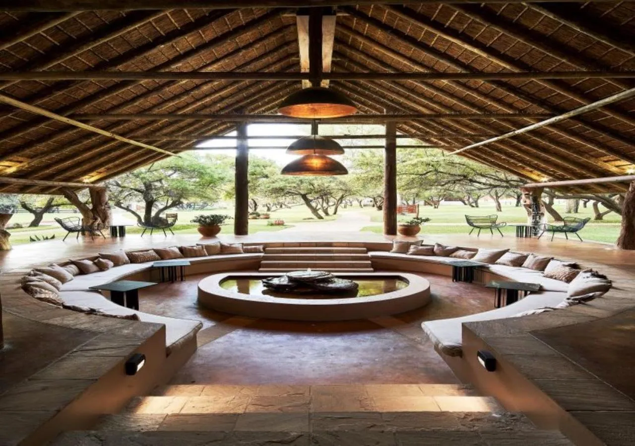 Seating area in Letamo at Qwabi Private Game Reserve by NEWMARK