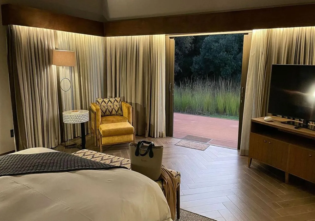 Bedroom, Bed in Letamo at Qwabi Private Game Reserve by NEWMARK