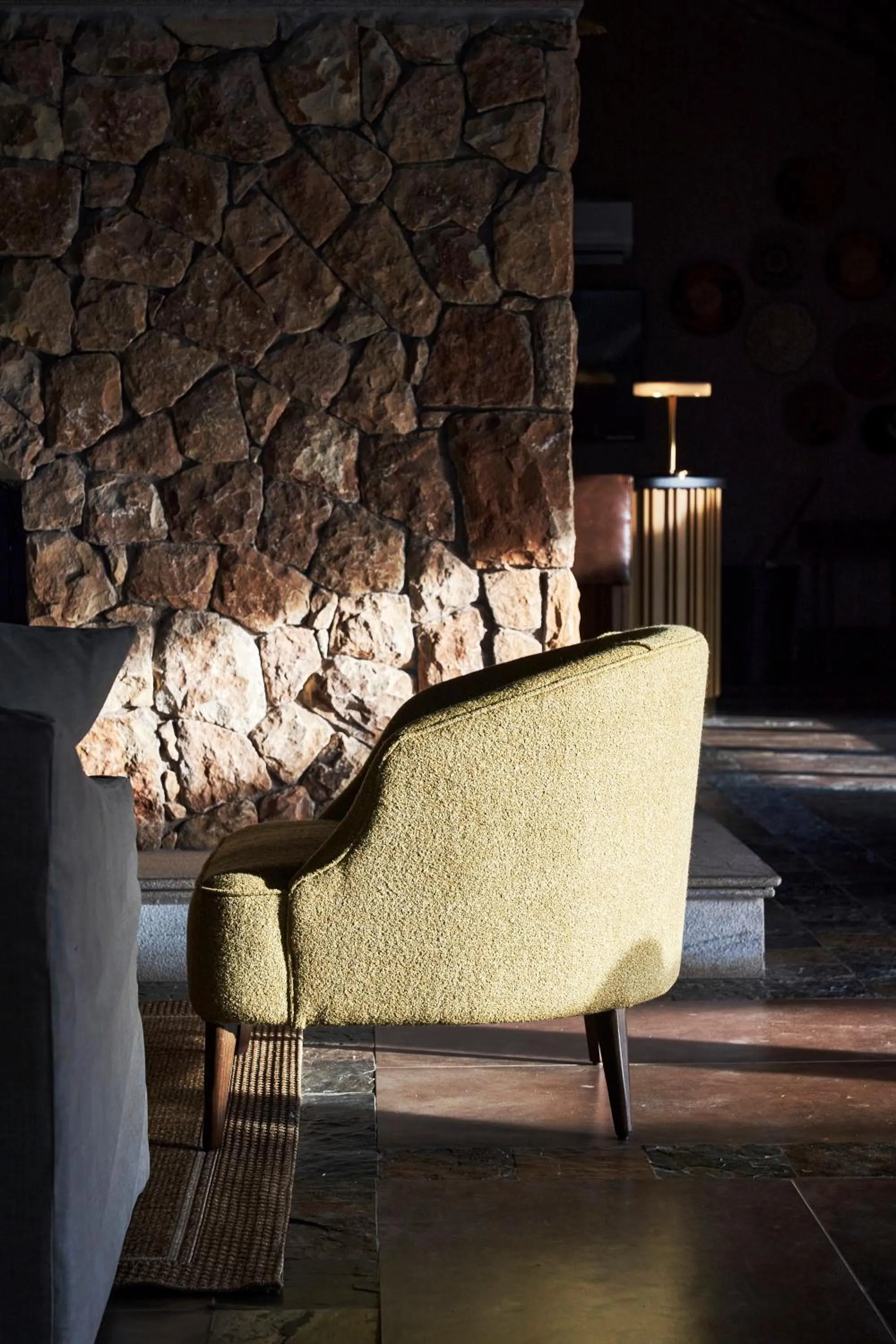 Seating area in Letamo at Qwabi Private Game Reserve by NEWMARK