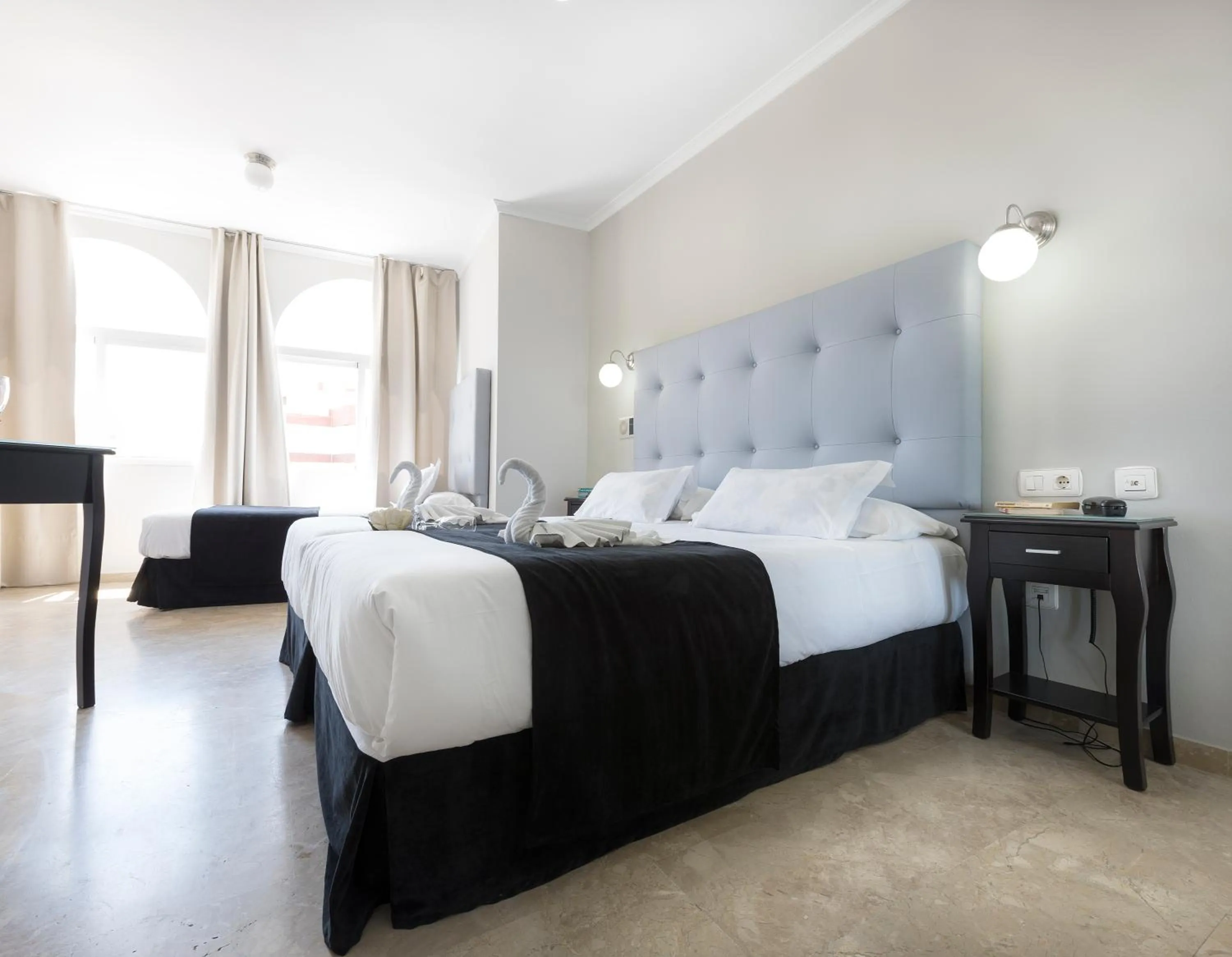 Bed in Hotel Toboso Chaparil