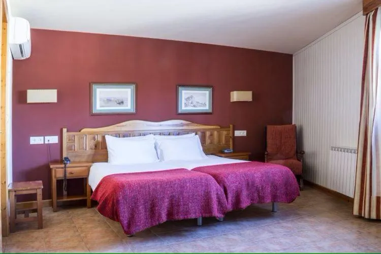 Bed in Hotel Alcadima