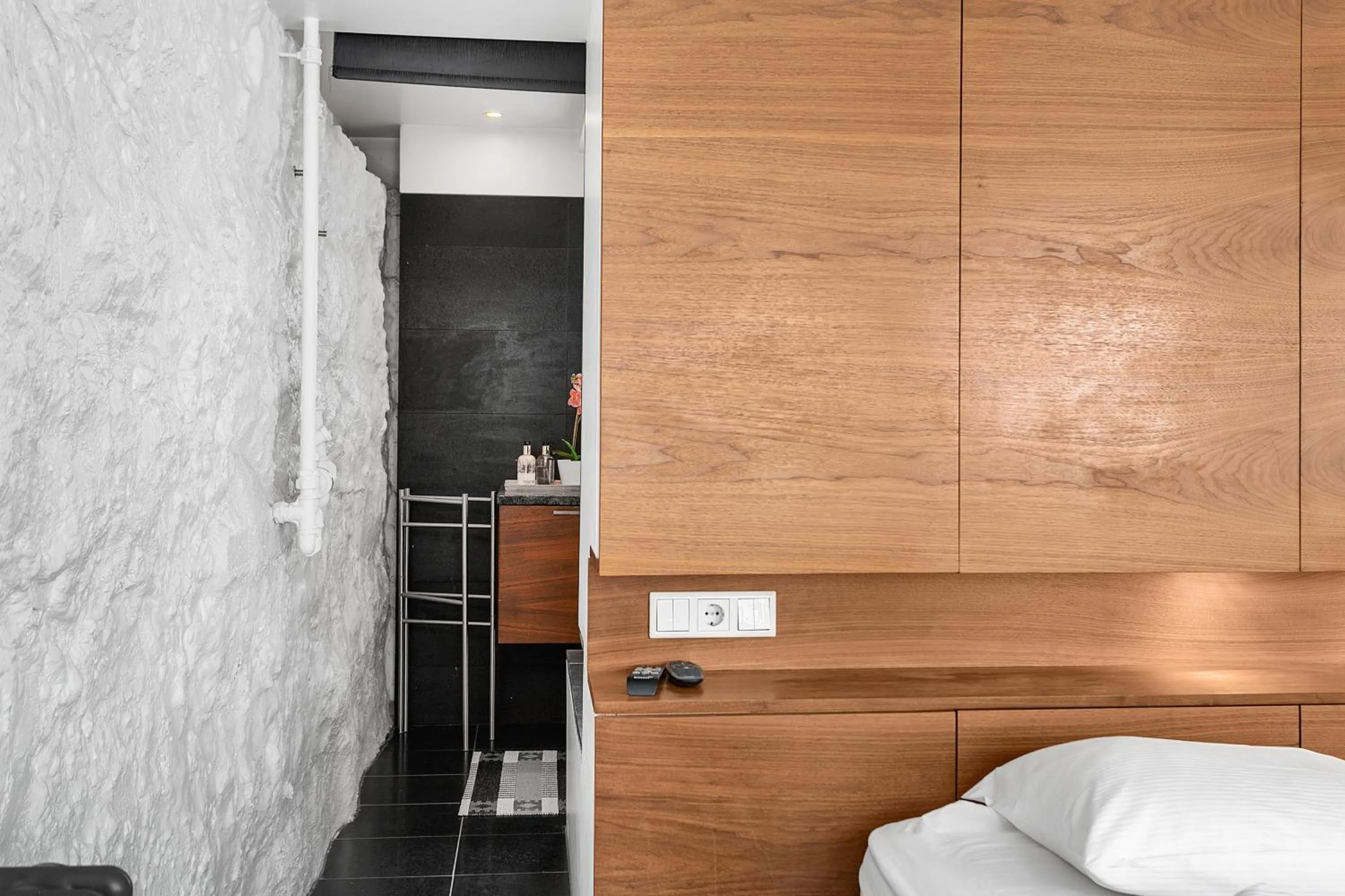 Bathroom, Bed in Baron Downtown Apartments by Heimaleiga